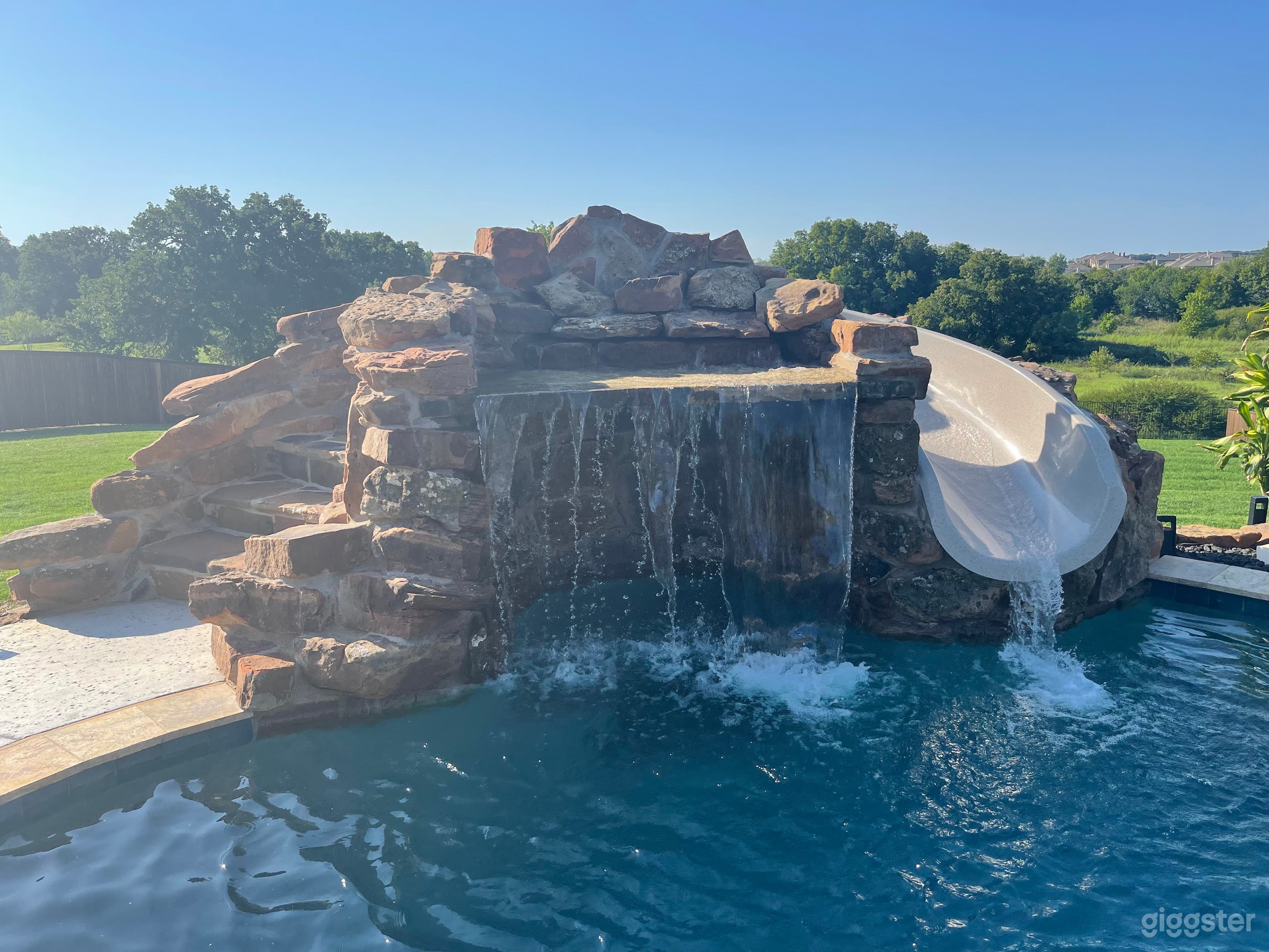 Beautiful Tropical Pool with Waterslide &amp; Grotto Photo 1