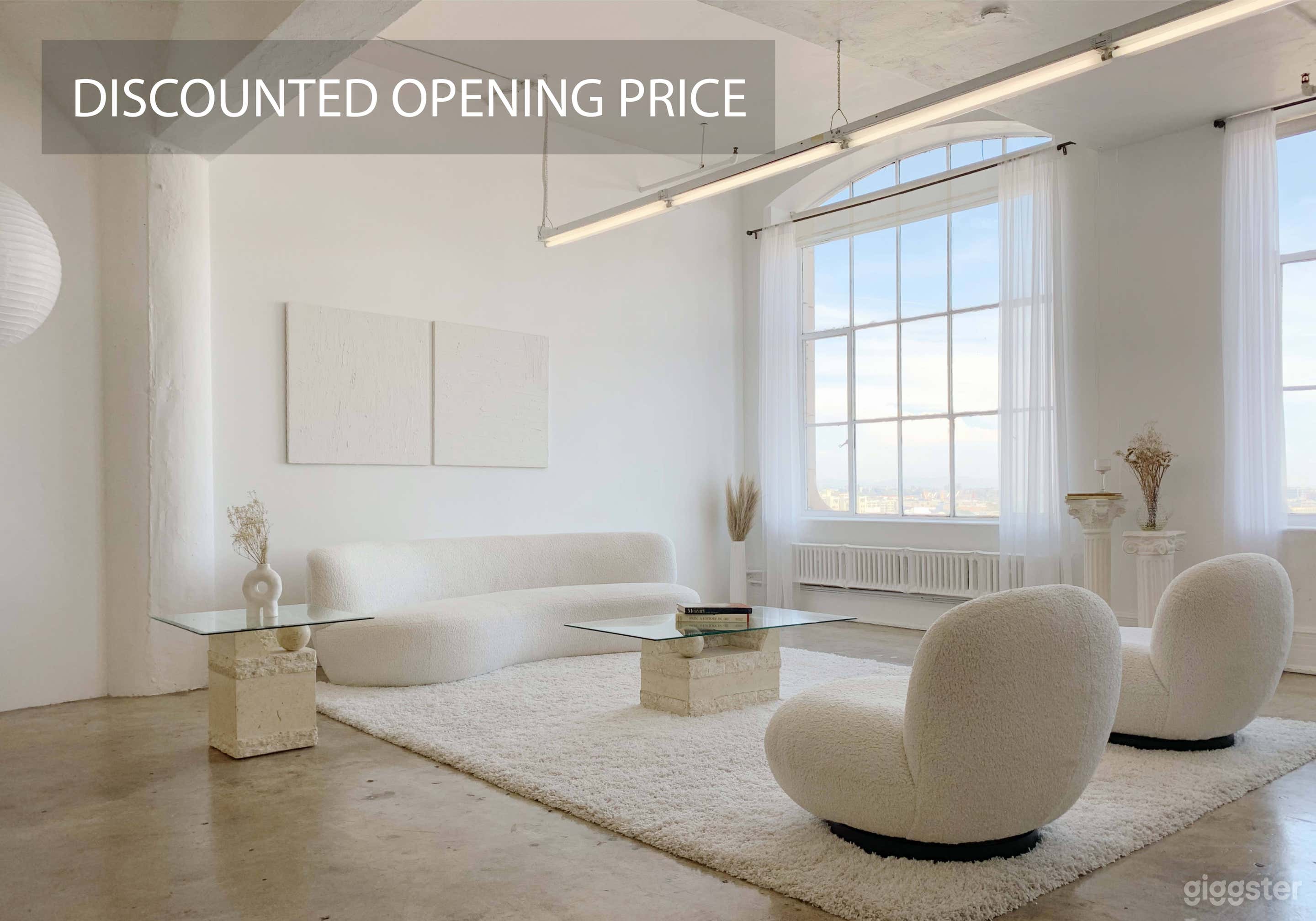 Spacious modern photo studio in Downtown Los Angeles. White, muted tones to make the perfect background. 