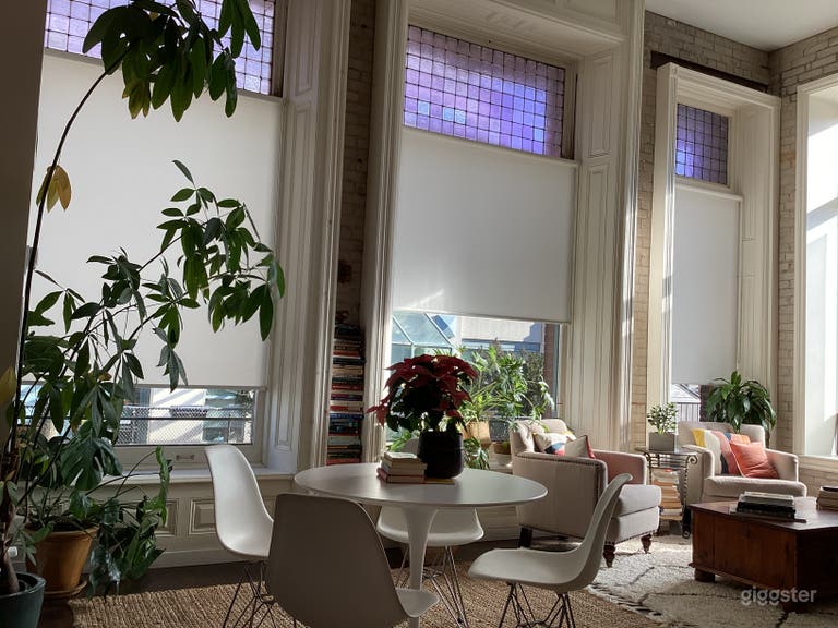  East facing floor to ceiling windows x 3 with transom stained glass windows. 