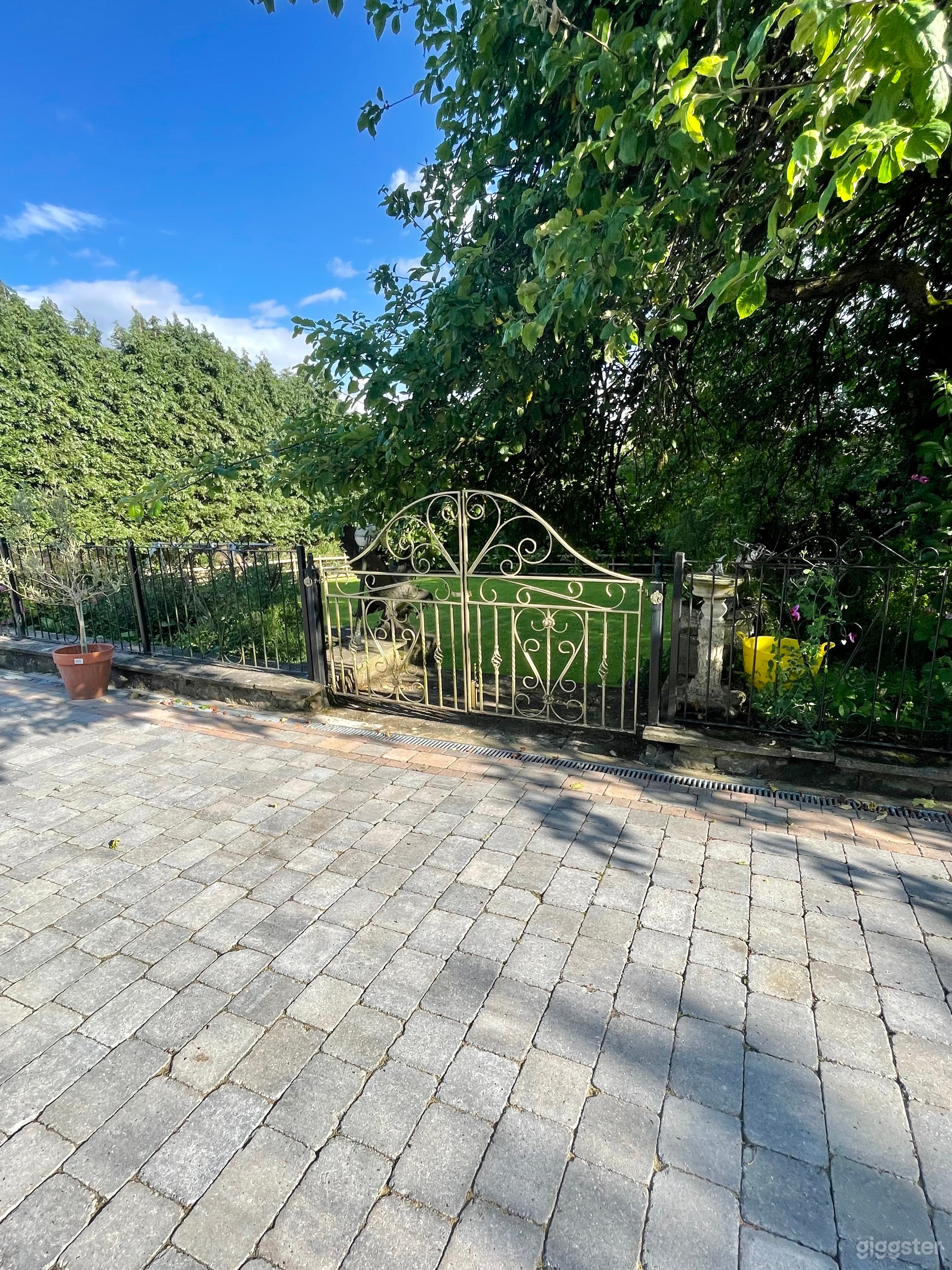 Golden painted gates to garden 