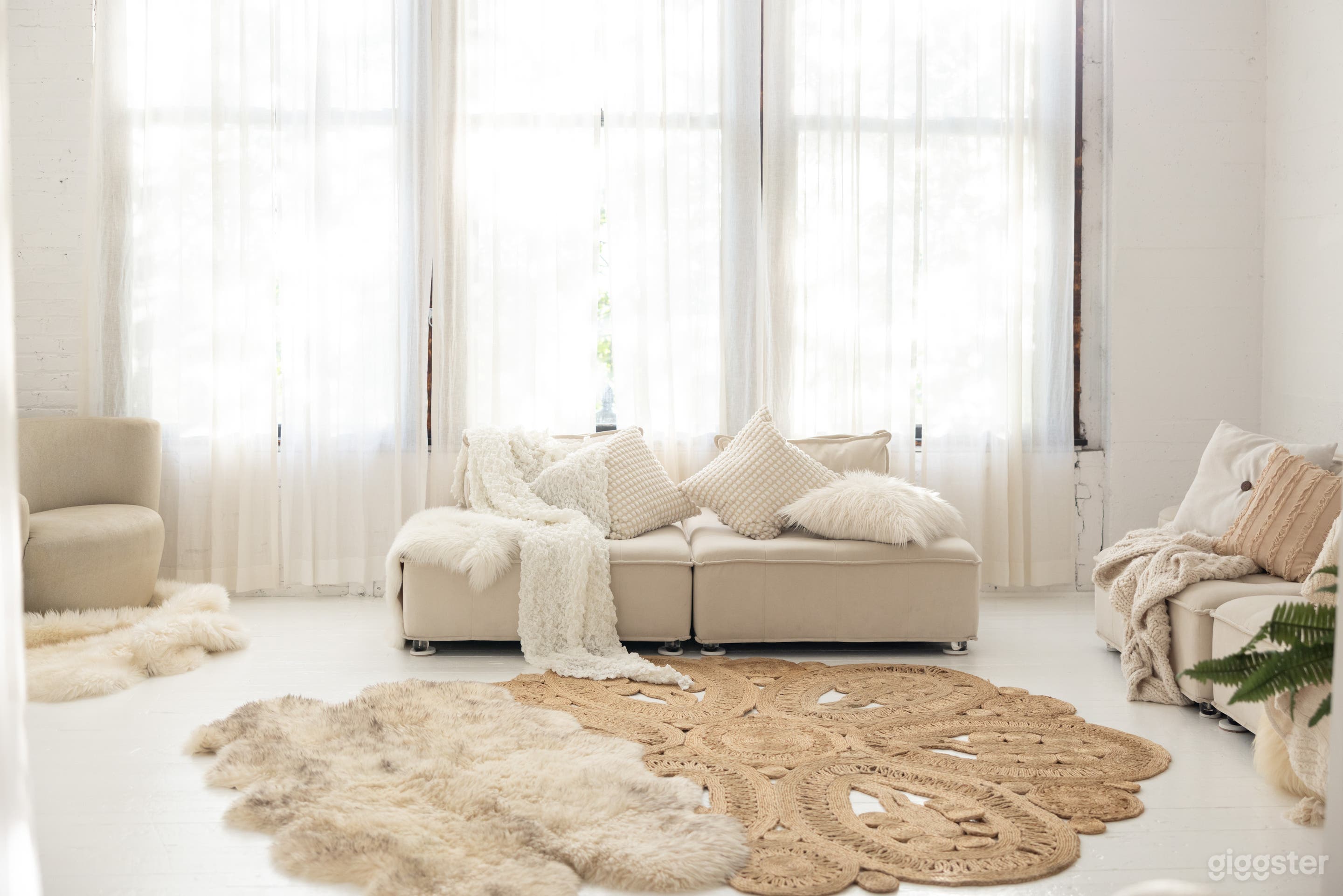 These modular seats can be moved to fit your needs...Tall natural light with white walls that act to reflect and really enhance natural light photography