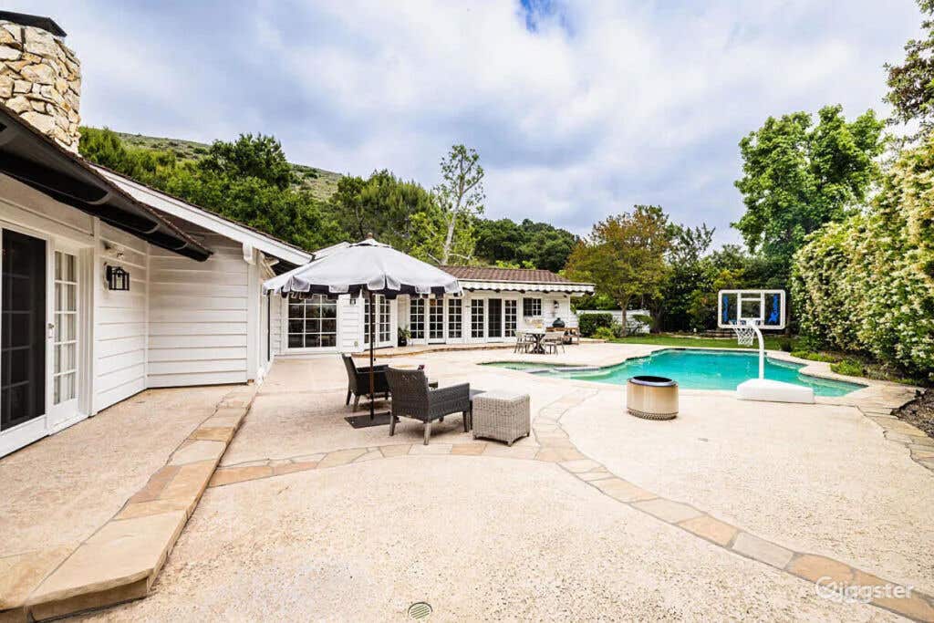 Large Backyard pool with mountain / canyon views Photo 2
