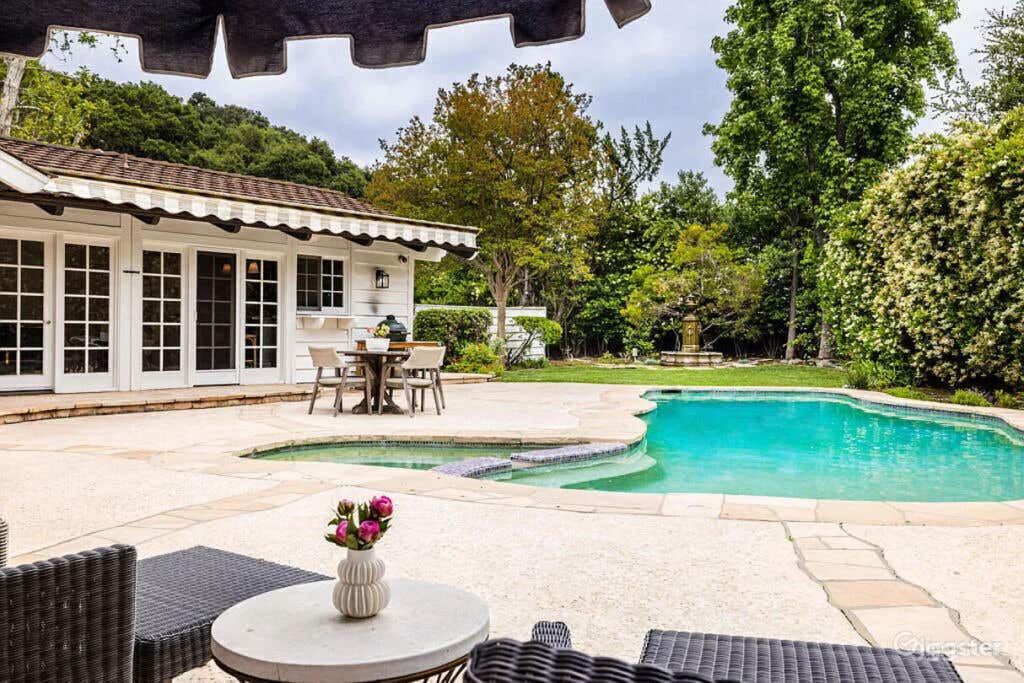 Large Backyard pool with mountain / canyon views Photo 1