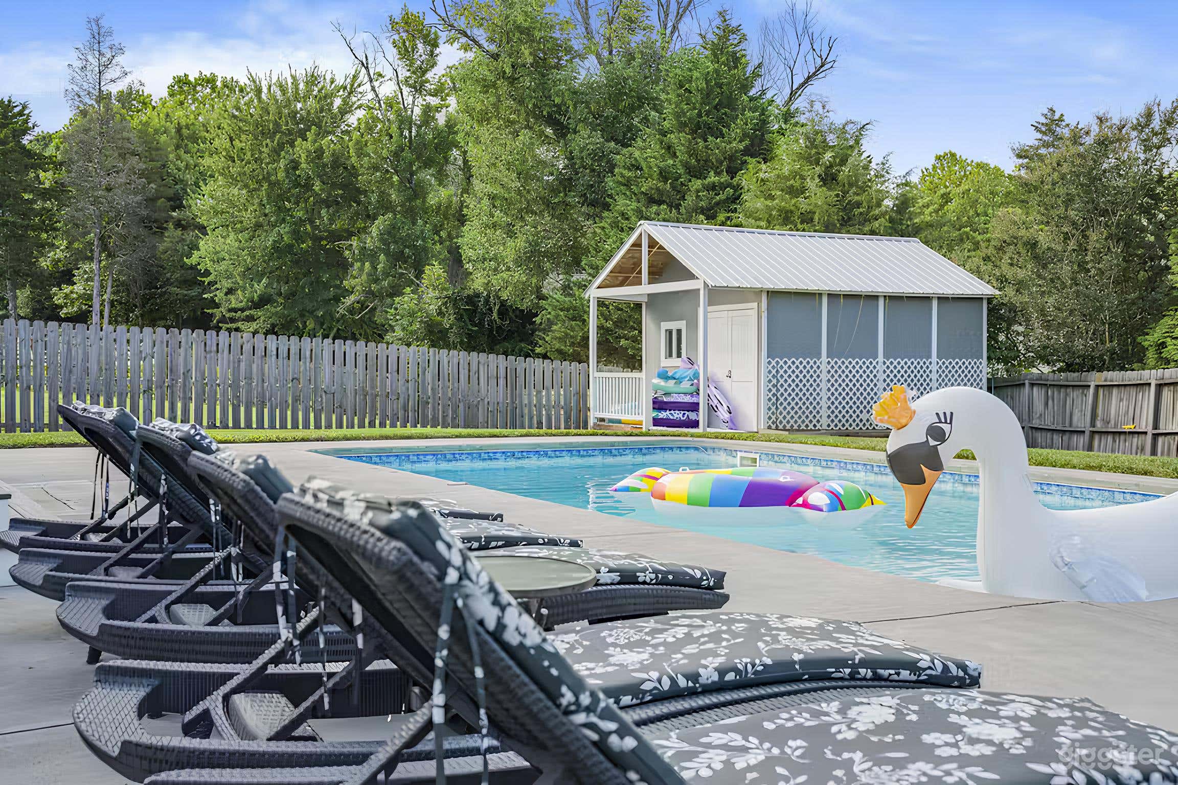 Backyard Pool with a Big Cove Porch Photo 4