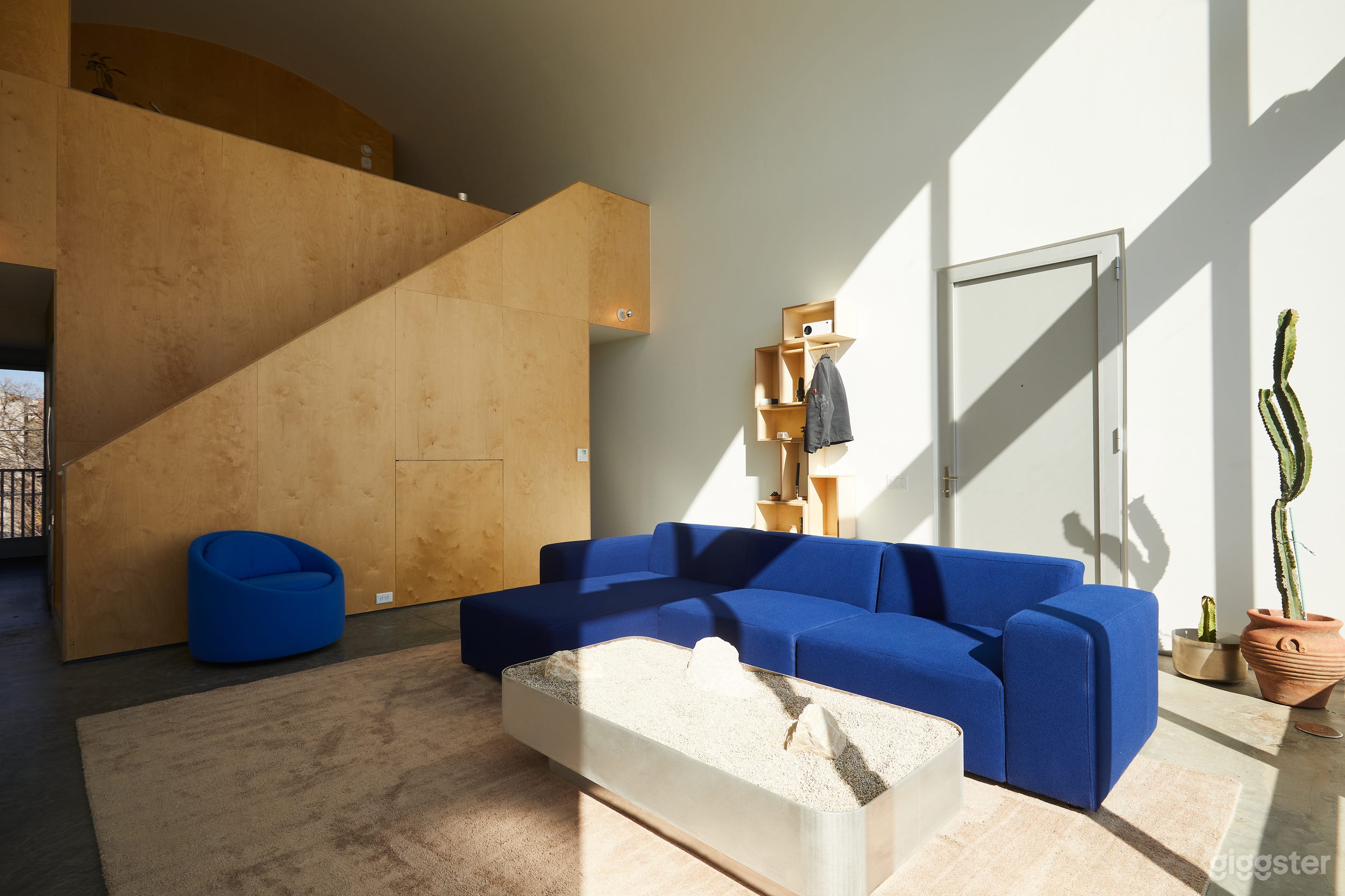 Luxury Urban Loft with Abundant Natural Light for Film Photo 4