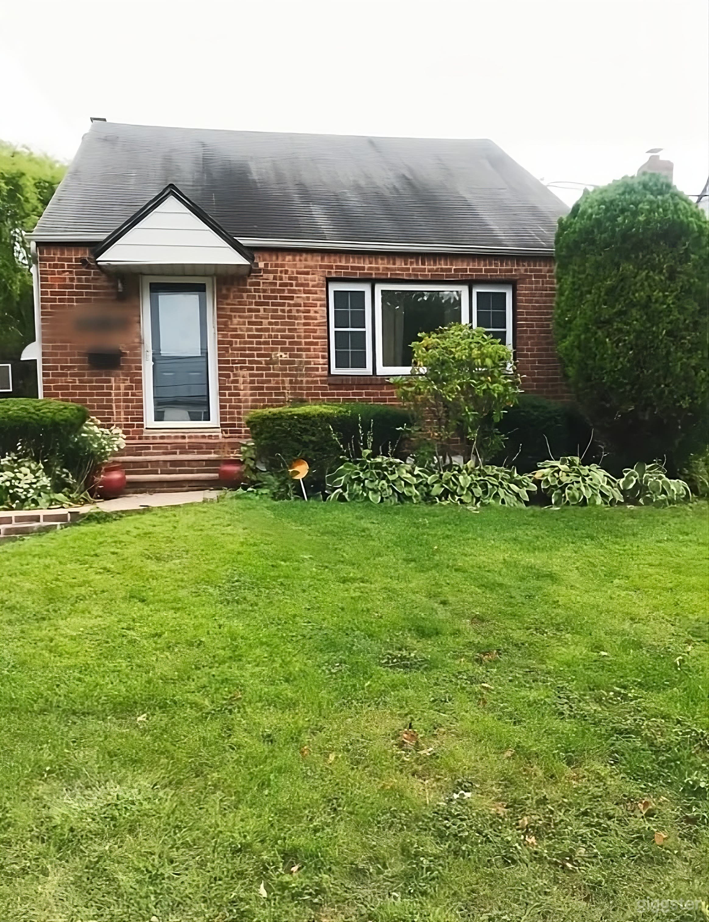 Cozy Fenced Lush Backyard Photo 4