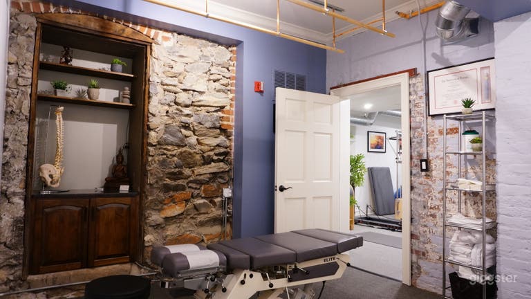  Physical Therapy/Chiropractic Room with massage bars in the ceiling 