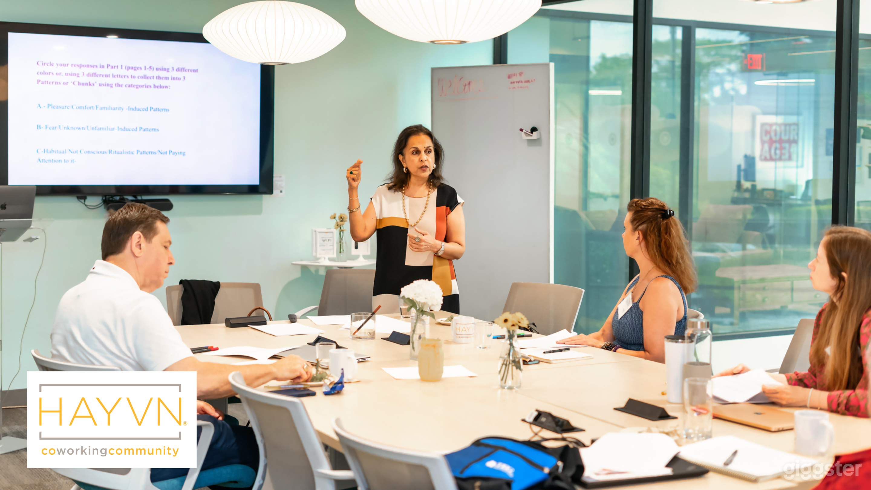 2. Conference Table Setup — In Action

This layout in use shows how seamlessly groups can gather around the central table for productive conversations and presentations. Perfect for board meetings, strategy sessions, and team planning days.