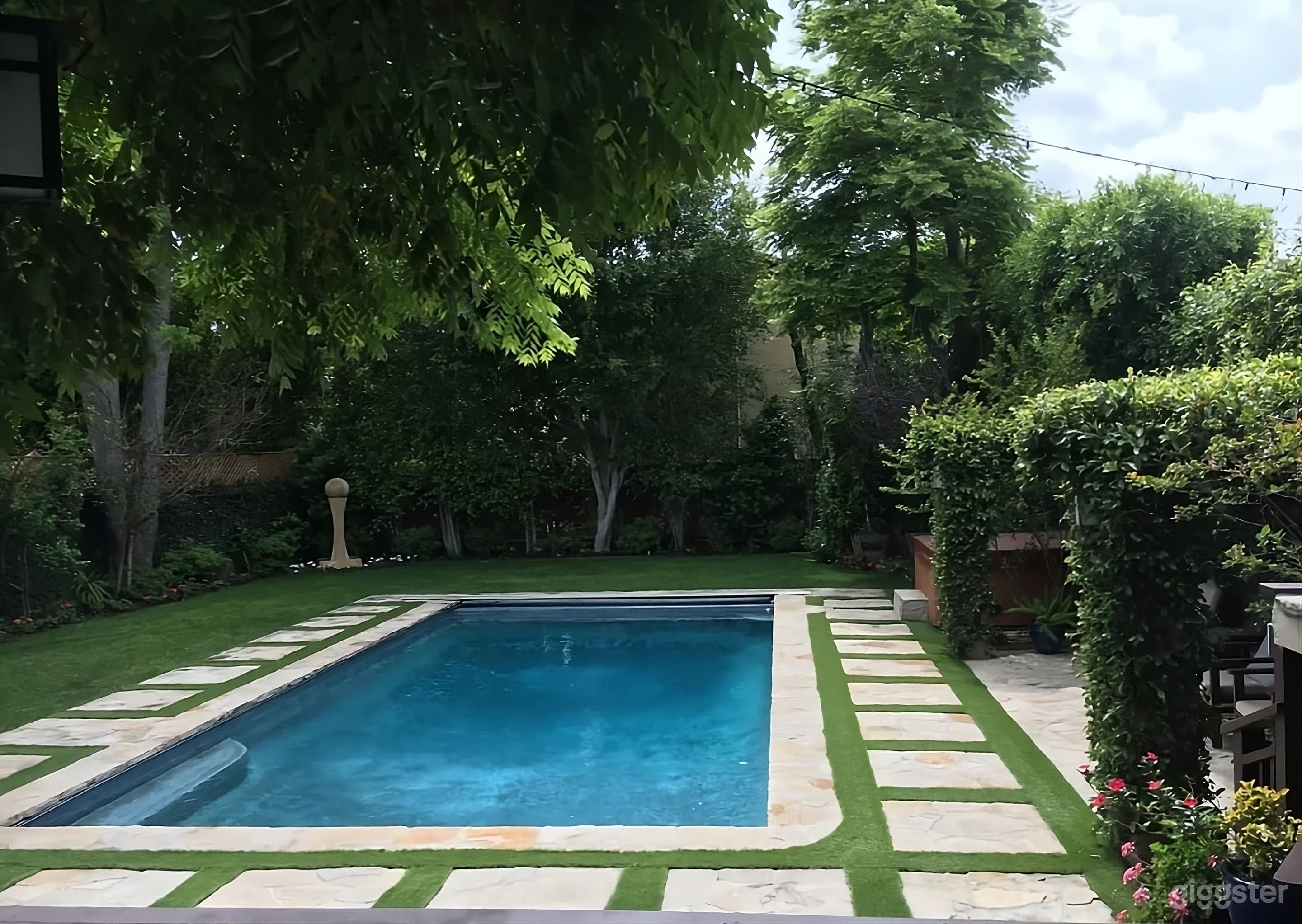 Stunning Mediterranean Backyard with Pool Photo 4