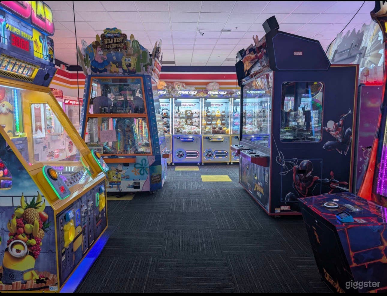 Vibrant Arcade with Neon Lights & Classic Games Photo 3