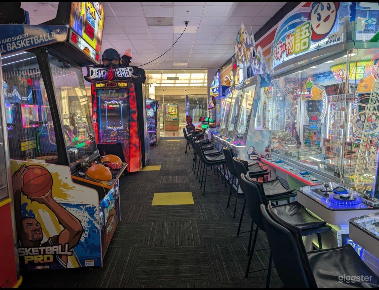 Vibrant Arcade with Neon Lights & Classic Games Photo 4