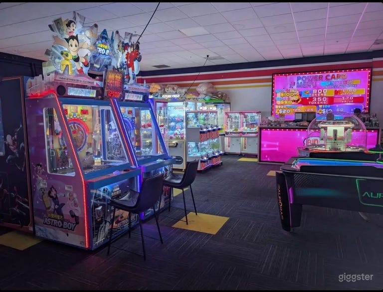  Vibrant Arcade with Neon Lights & Classic Games 
