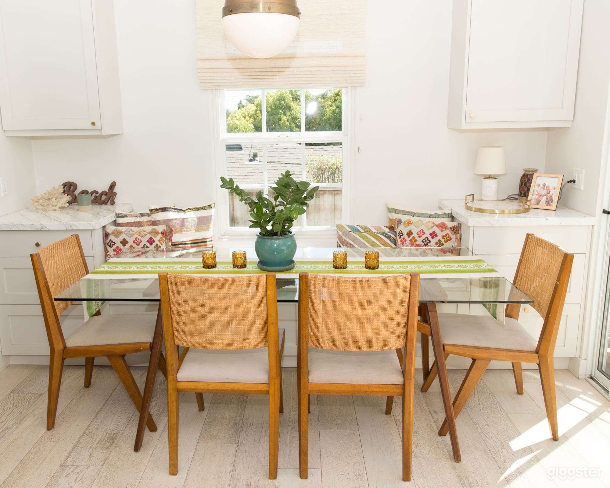 Glass table and banquette