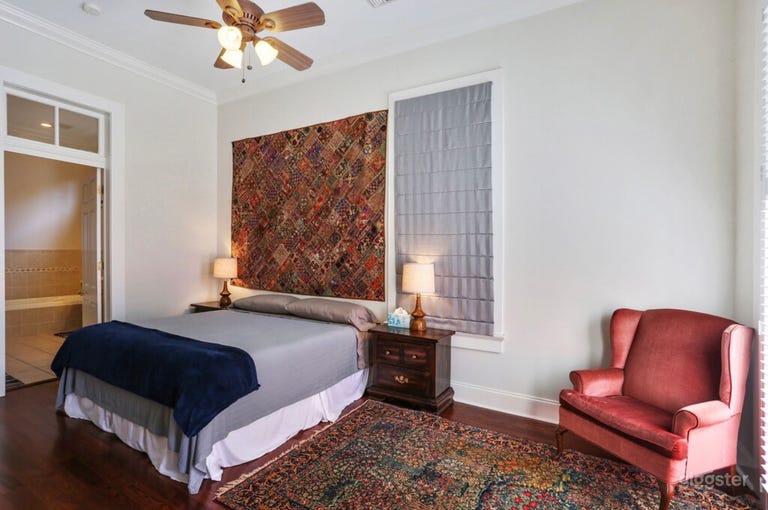  Primary bedroom with king bed and sitting area. 