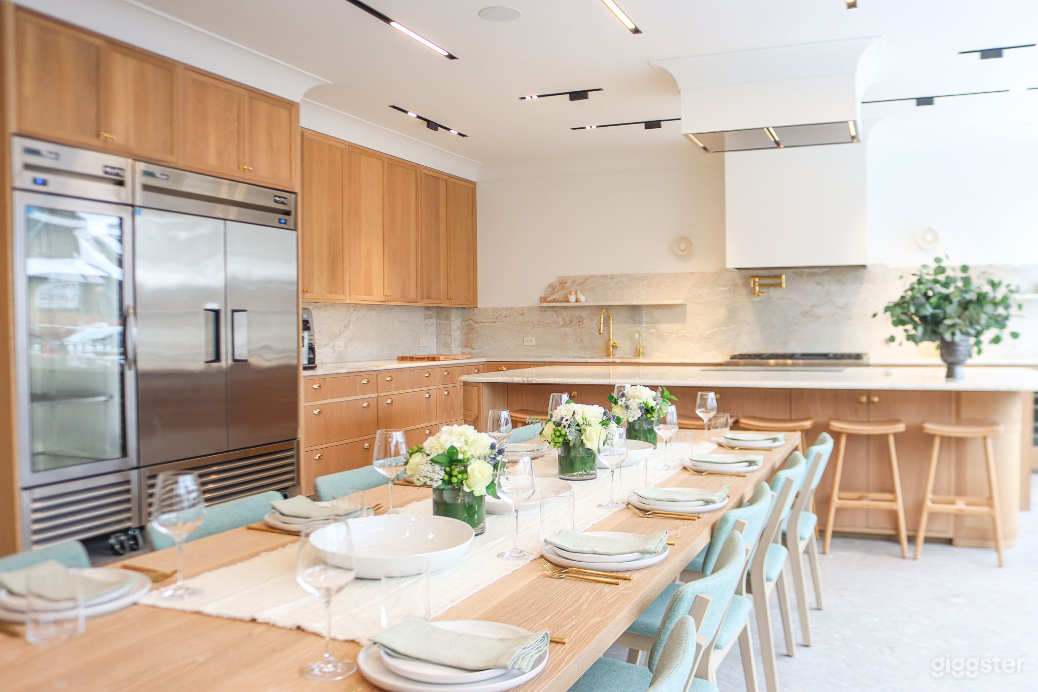 2 Fridges and 1 fridge with freezer unit.  2 dishwashers, full sanitation sink, ice machine warming drawers and a large wine fridge. 