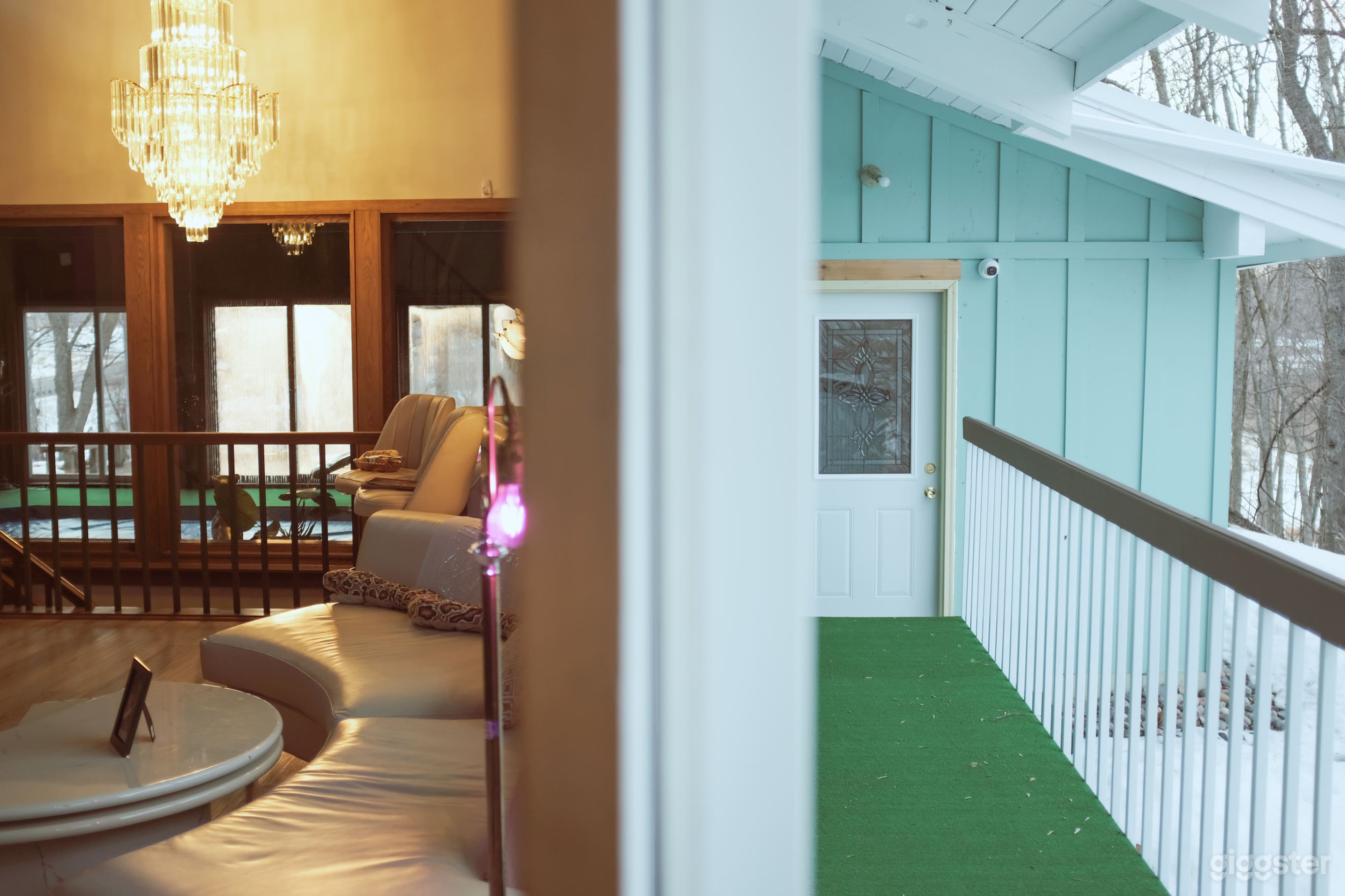 living room and back deck that overlooks the creek