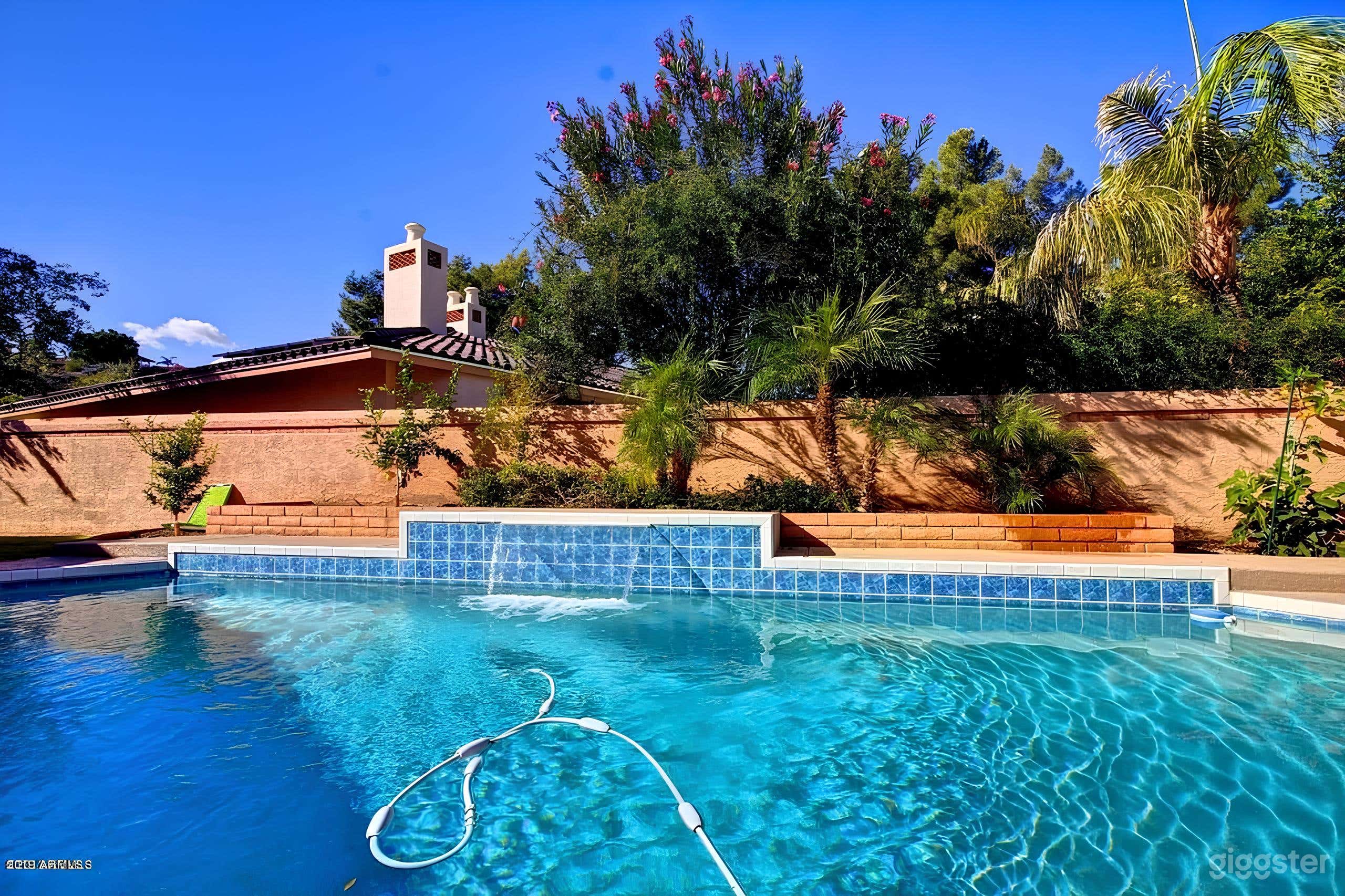 Picturesque Pool with Waterfall Photo 3