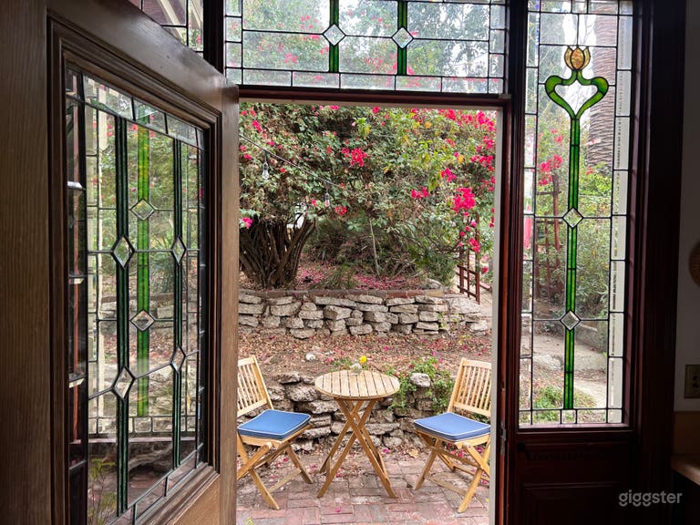  Stained glass kitchen window and backdoor that leads to the backyard 