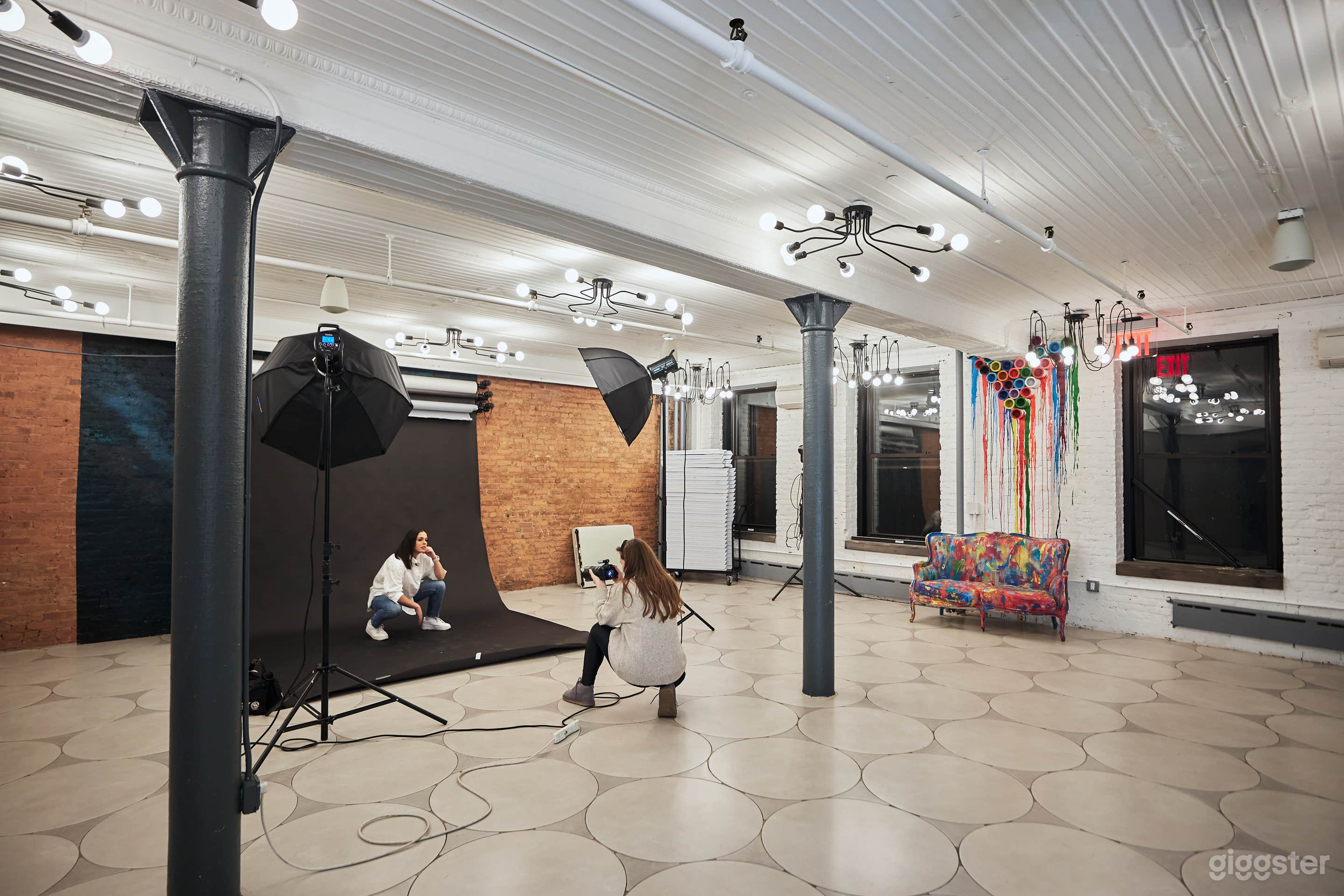 Spacious photo studio with professional lightning equipment included in rental
