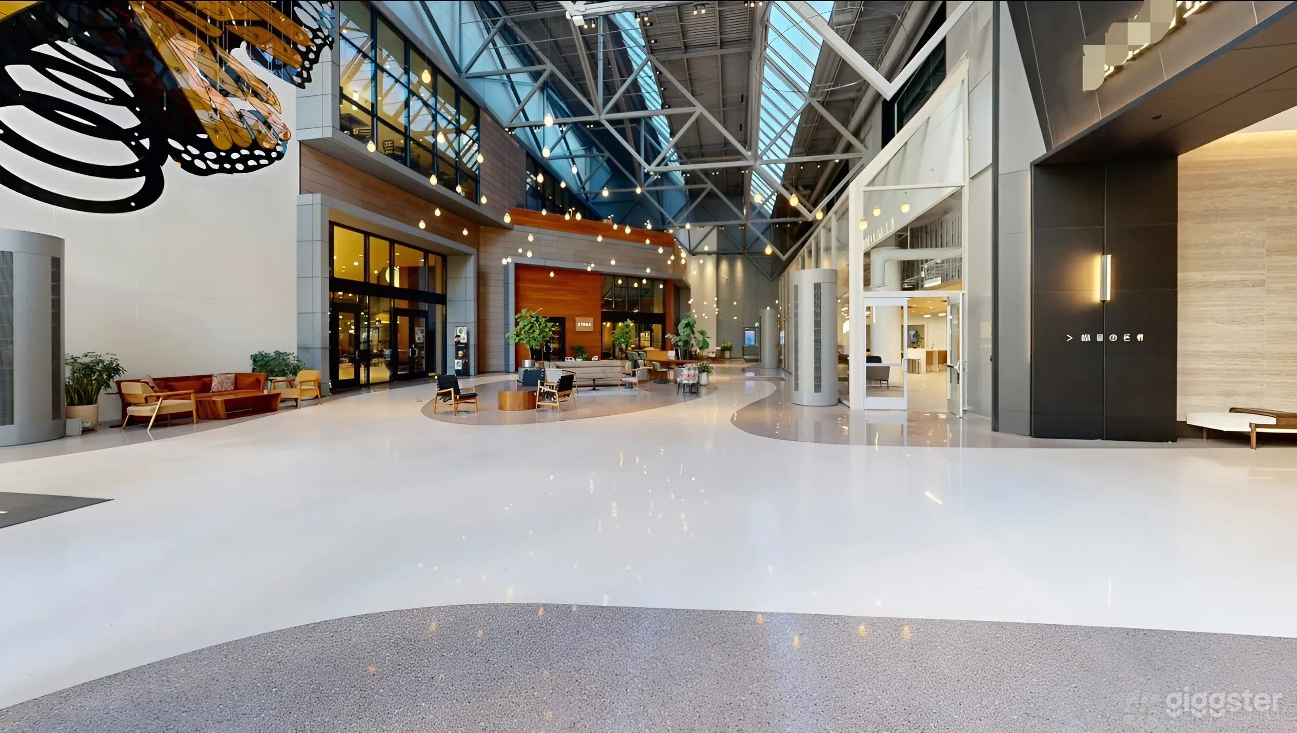 Grand Atrium with Vaulted Ceilings & Sculptural Centerpiece Photo 2