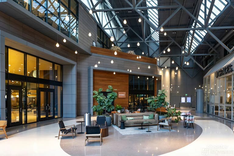  Grand Atrium with Vaulted Ceilings & Sculptural Centerpiece 