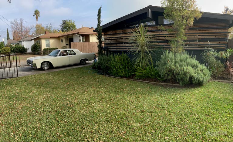  Front of the house w vintage Lincoln Continental  