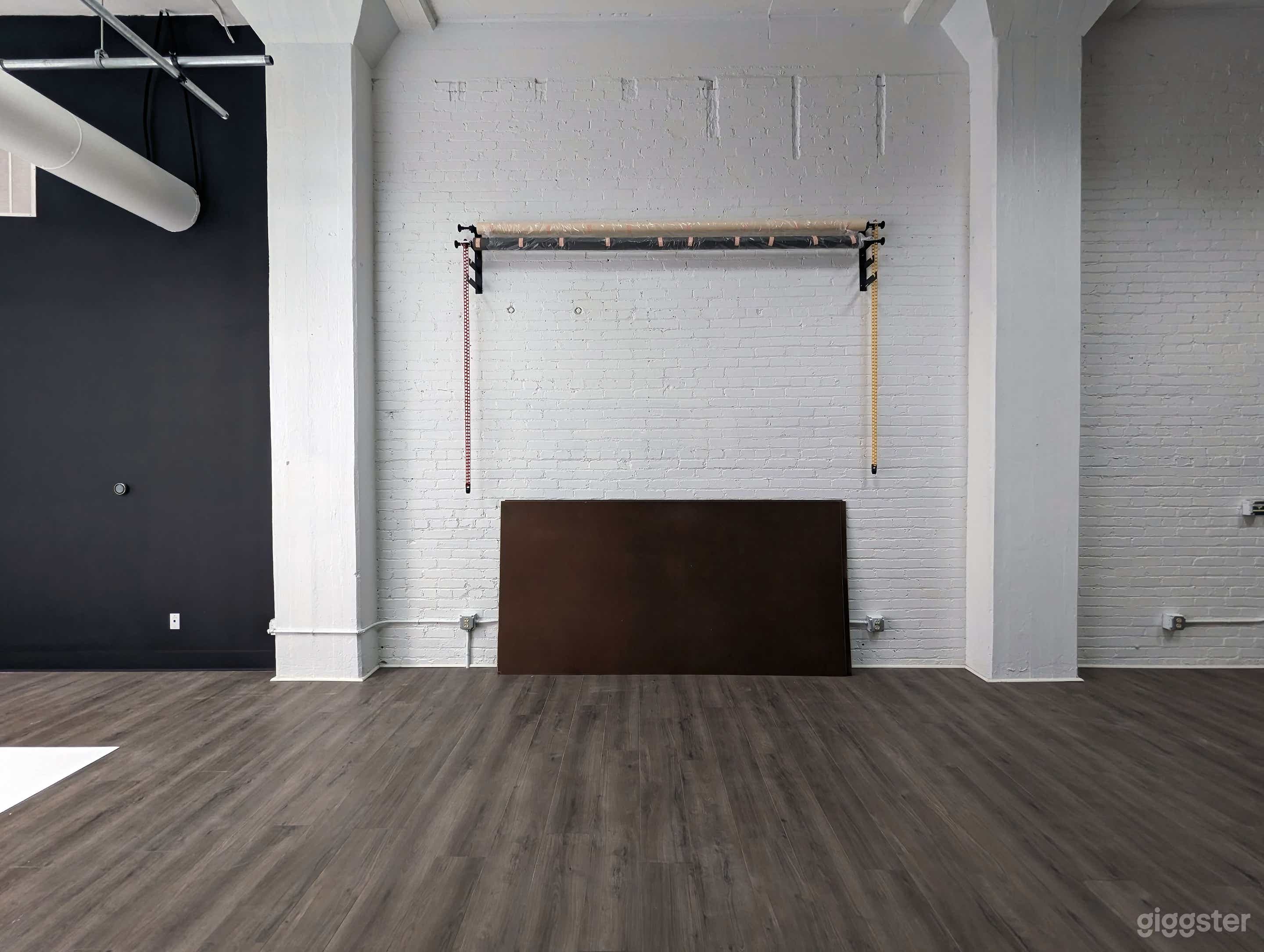 4 - 9ft seamless paper roll backdrop area. Rolls are at a 10ft high.