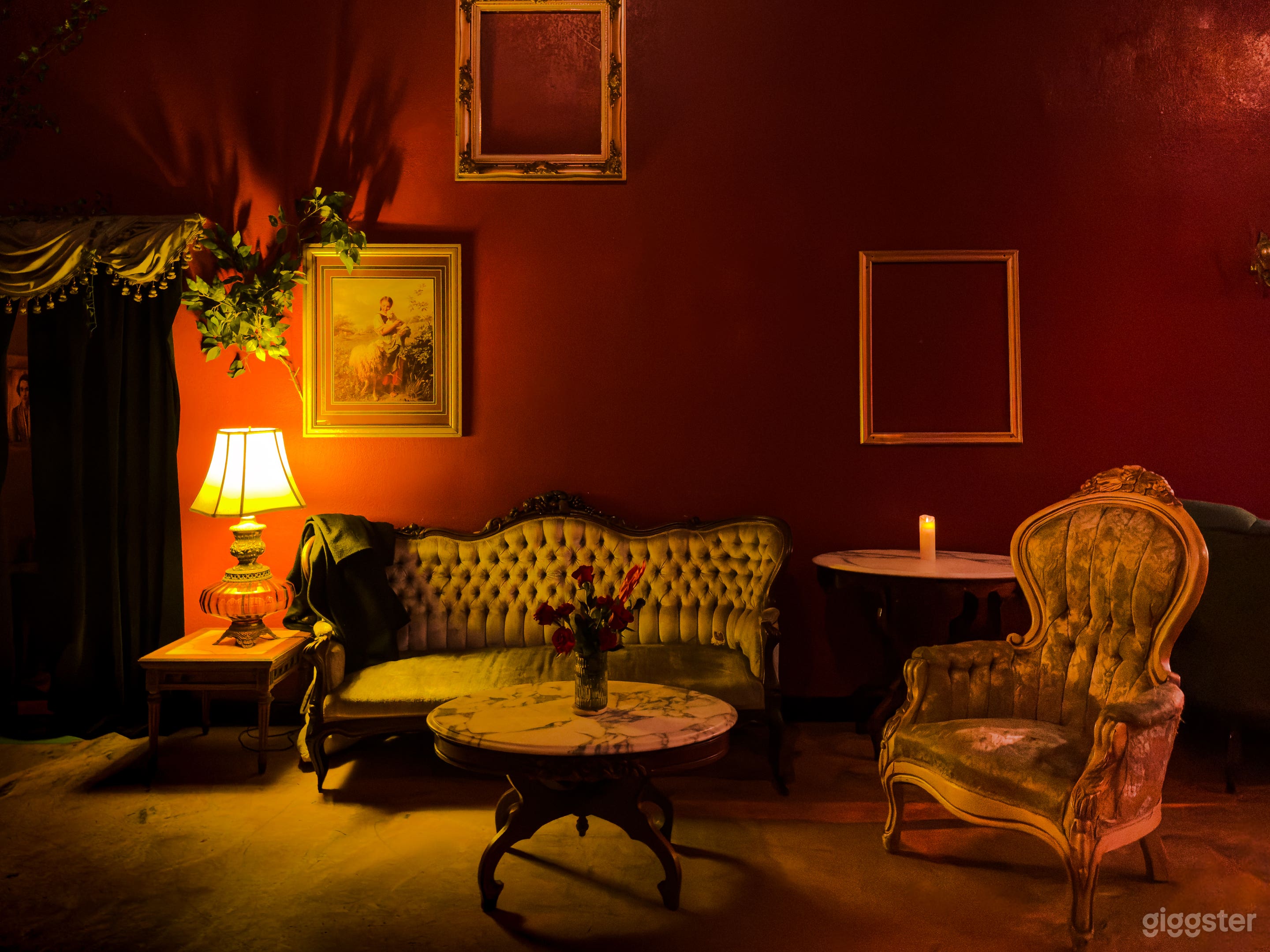 The main room has a couch, a dining table (perfect for seances!), chairs, and an old bookcase.