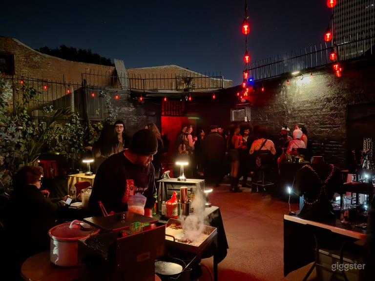  Our backyard area is equipped with string lights, and high tables and chairs. Smoking allowed. 