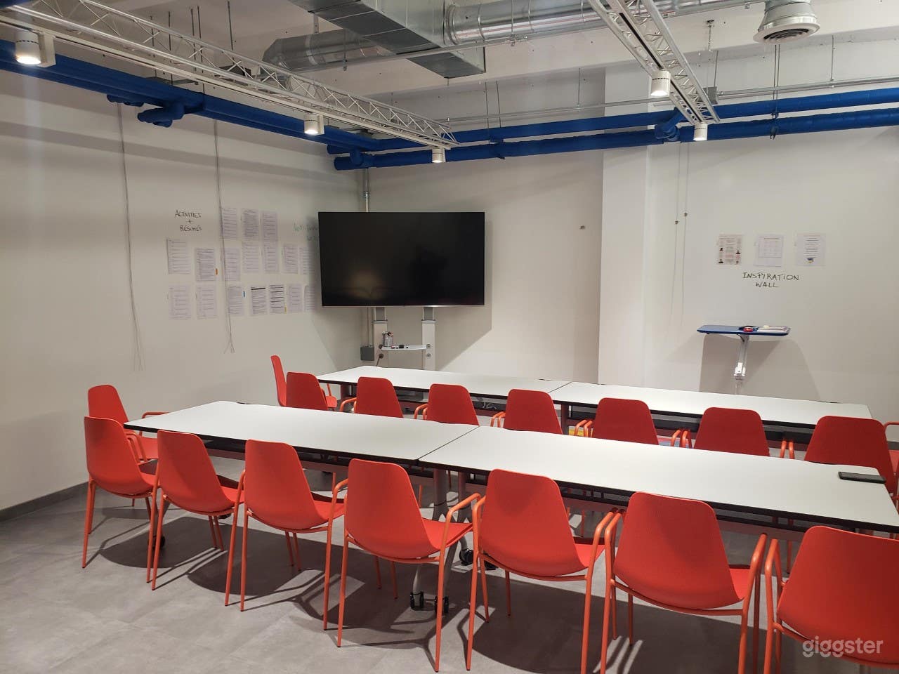 Different setup with tables - Walls are prepared to be used as whiteboards.