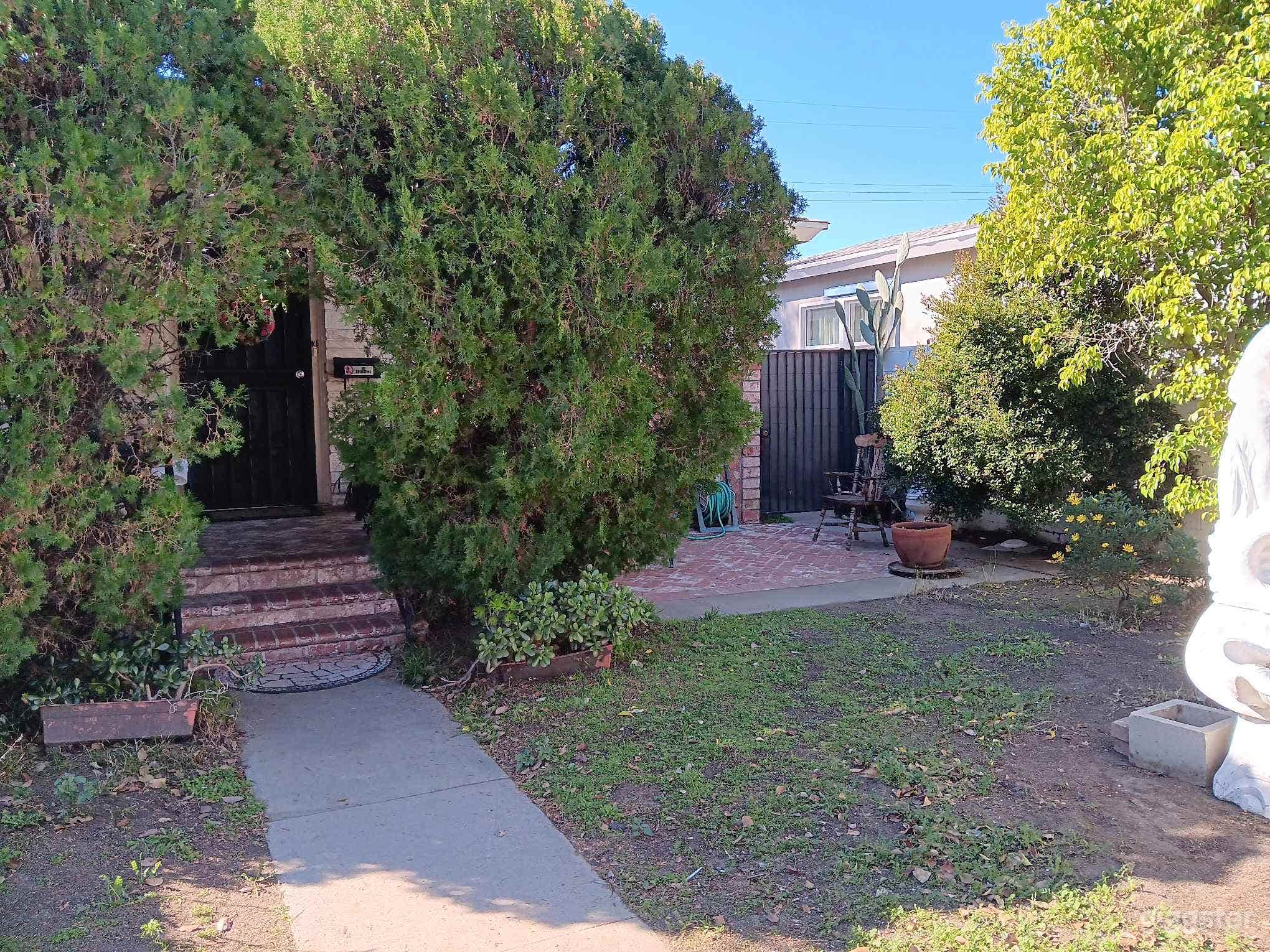 Front Porch with Front Yard and Fountain Photo 4