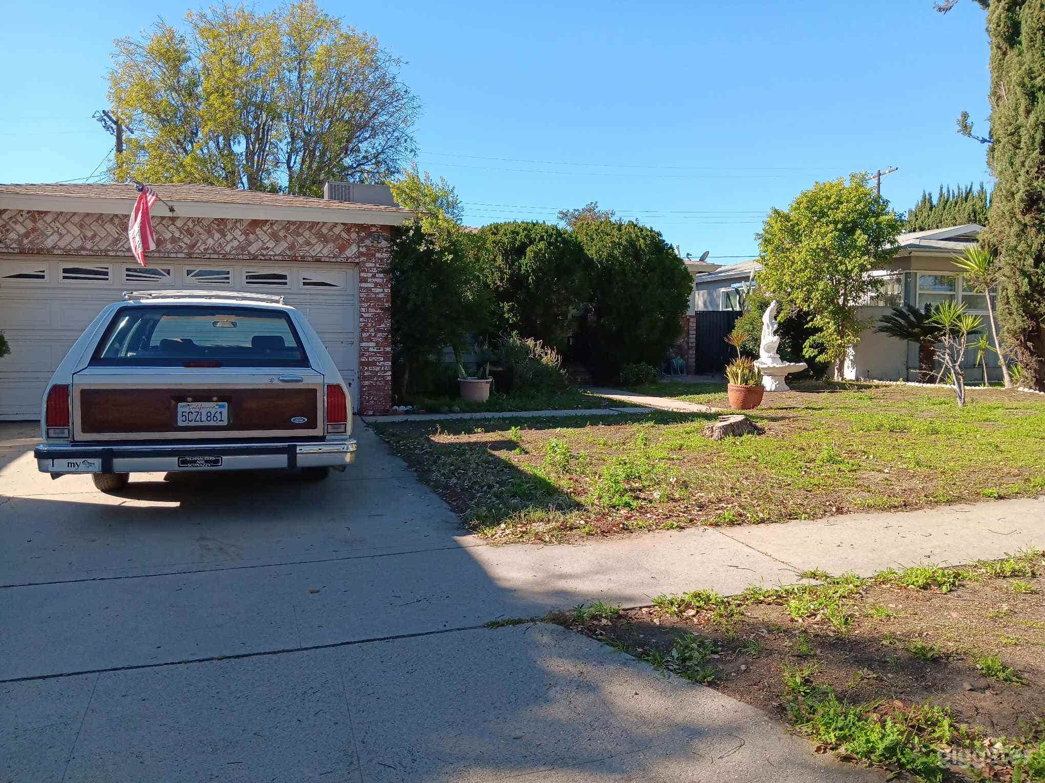 Front Porch with Front Yard and Fountain Photo 1