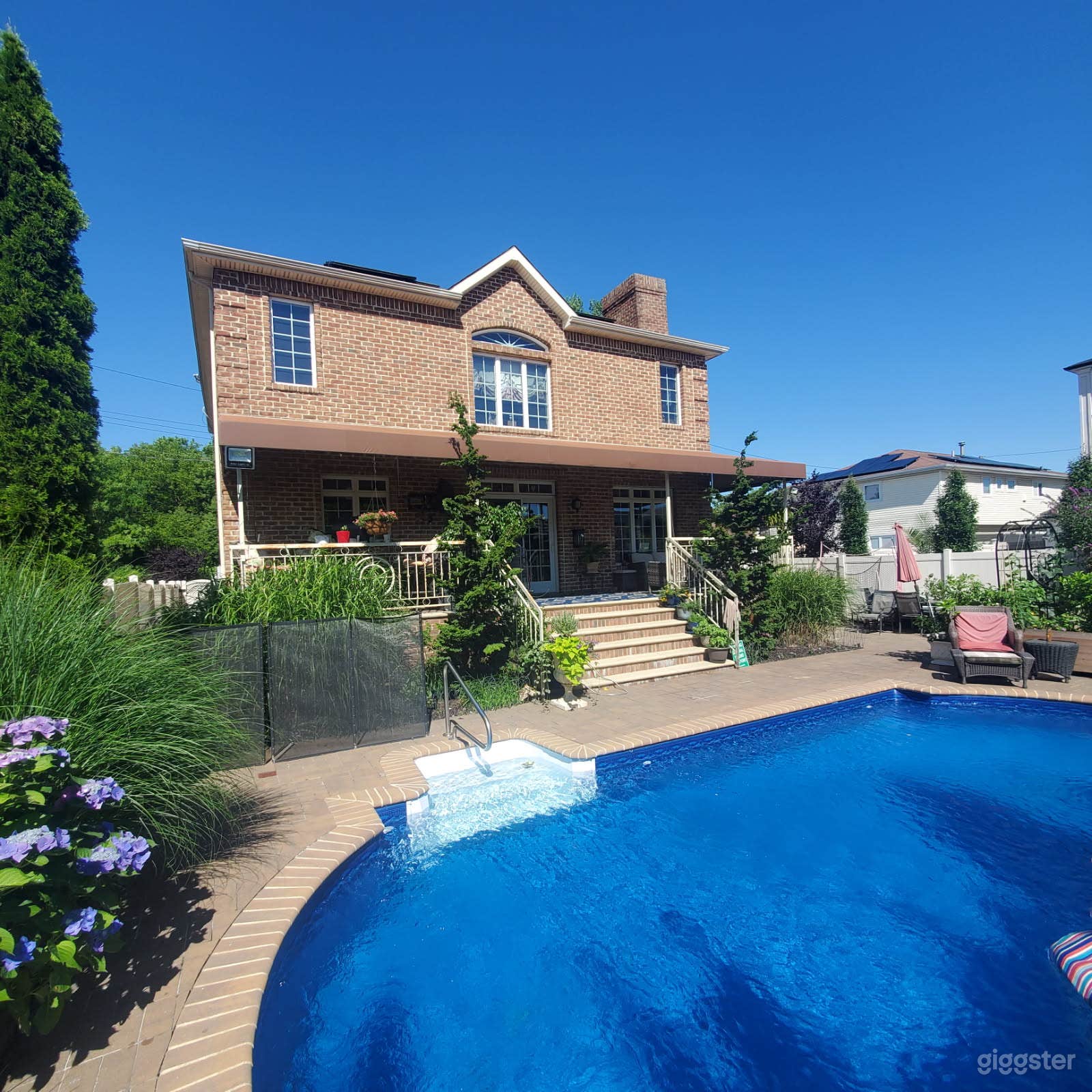 Full rear view looking west, facing east