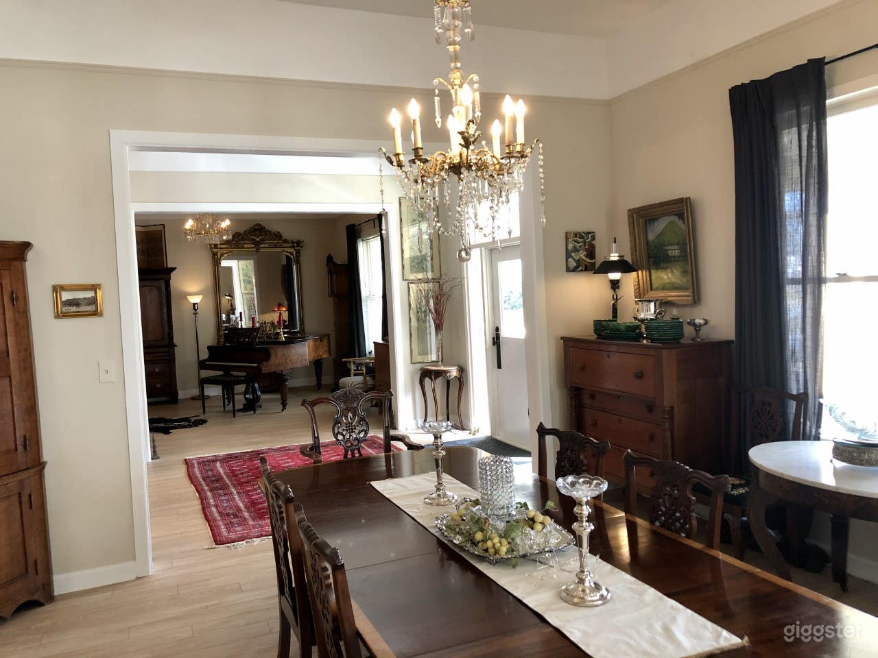 VIEW FROM DINING ROOM ACROSS ENTRANCE HALL TO LIVING ROOM