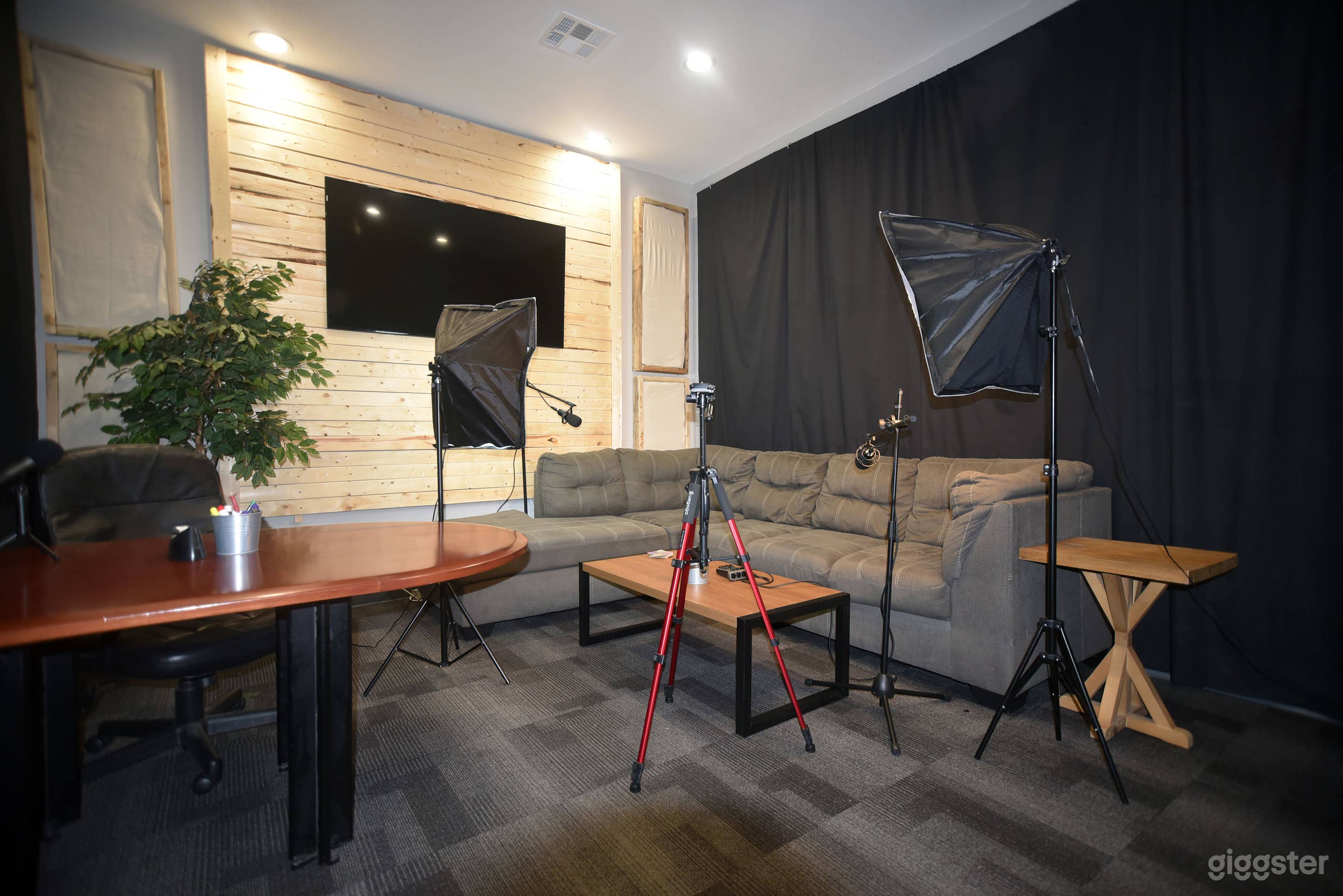 Large interview room, conference room, or livestreaming with guests. Includes lighting, mics, camera equipment, can be configured for your voice, your vision.