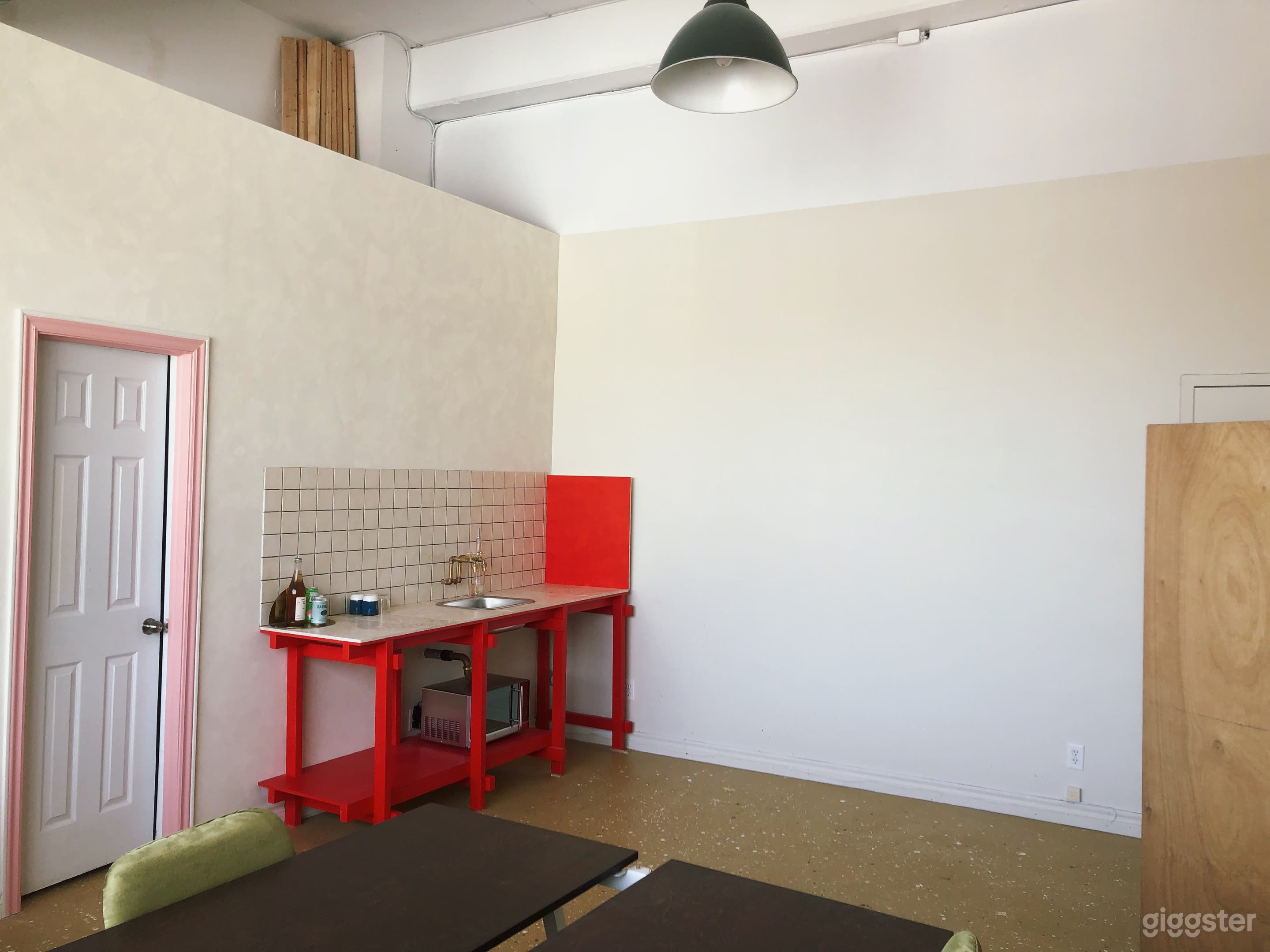 Kitchenette and open wall space (north facing windows behind)