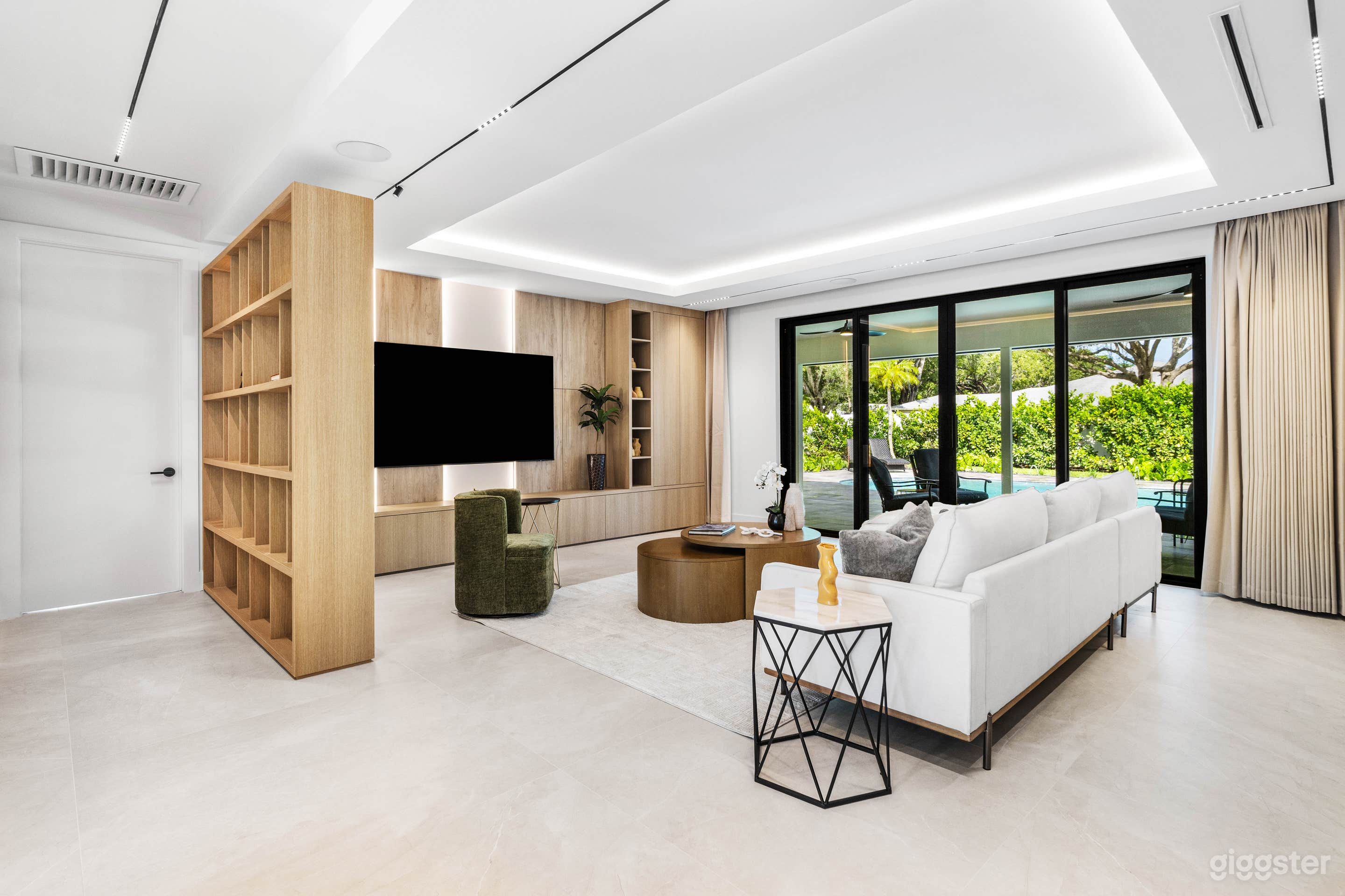 Designer Home with Resort Backyard & Chic Interiors Photo 3