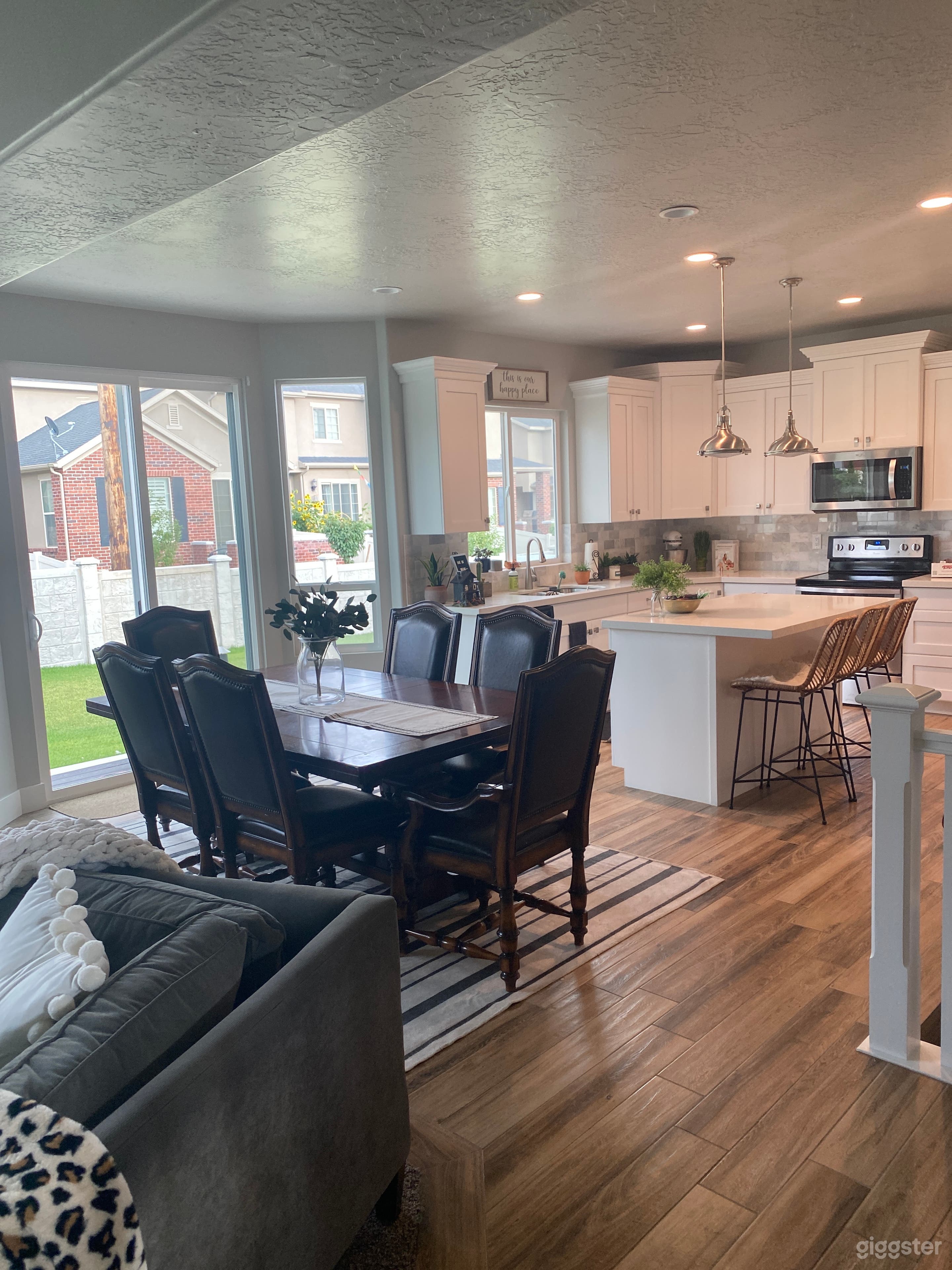 Dining room connected to family room and kitchen. 