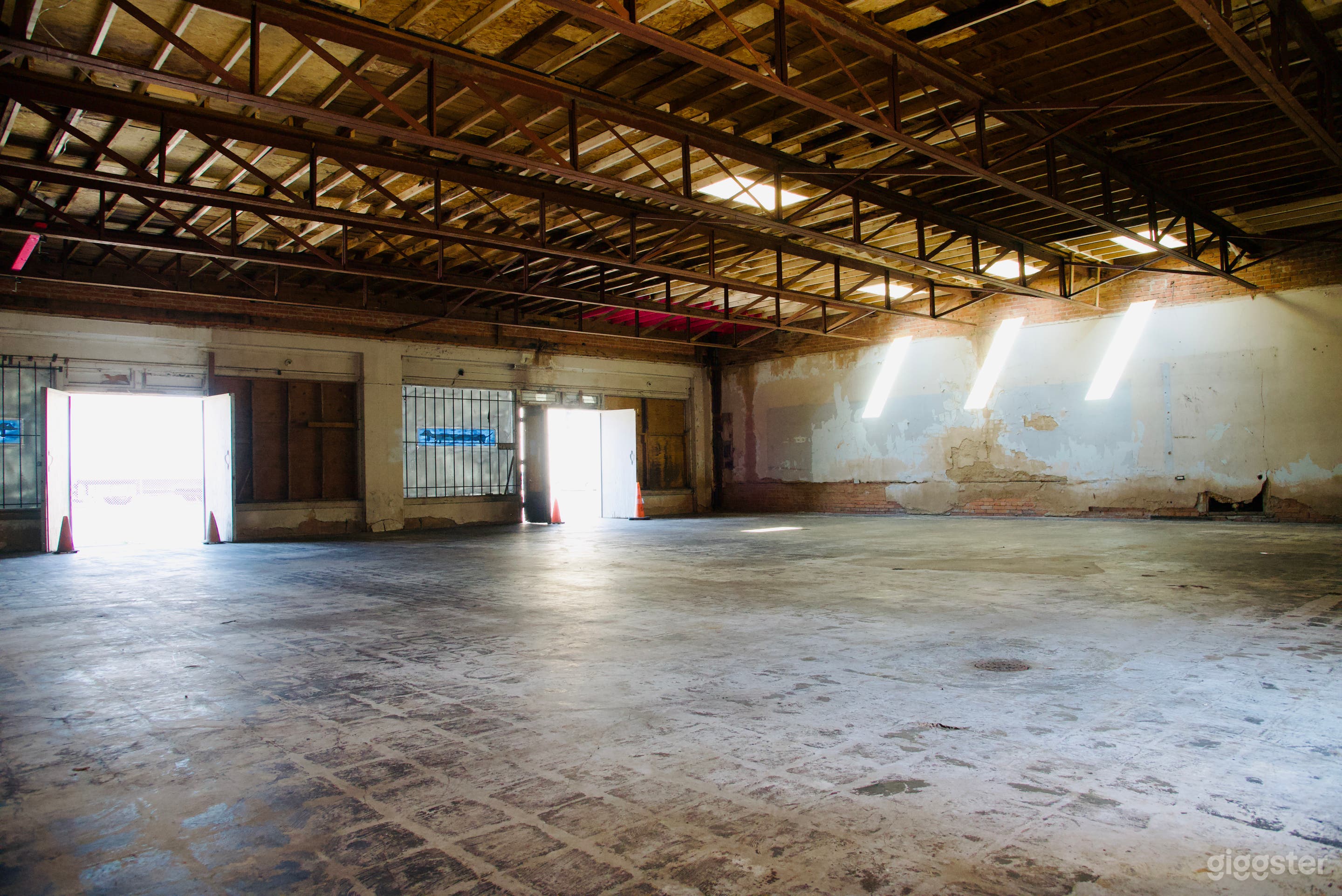 Main Room 50 x 50 sq/ft
6 ft. front doors for loading in/out.