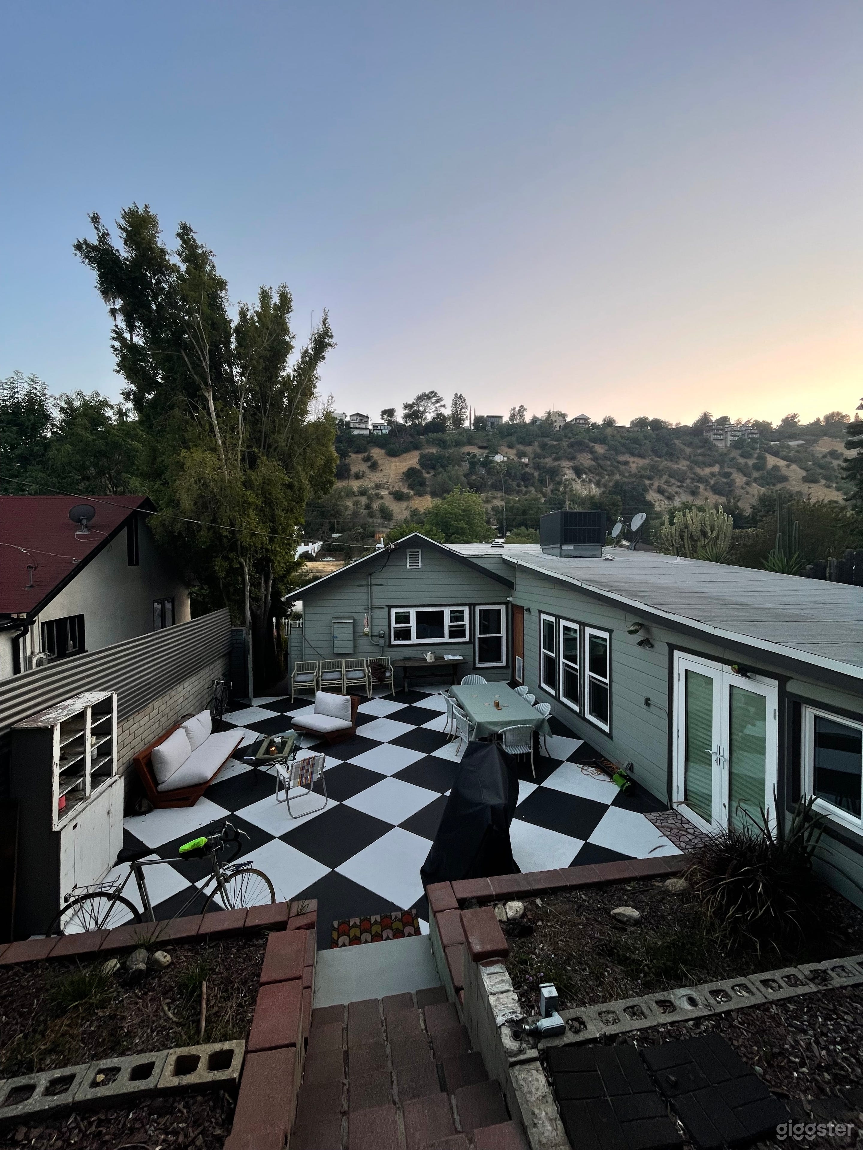 Charming Patio & Lush Backyard Photo 1