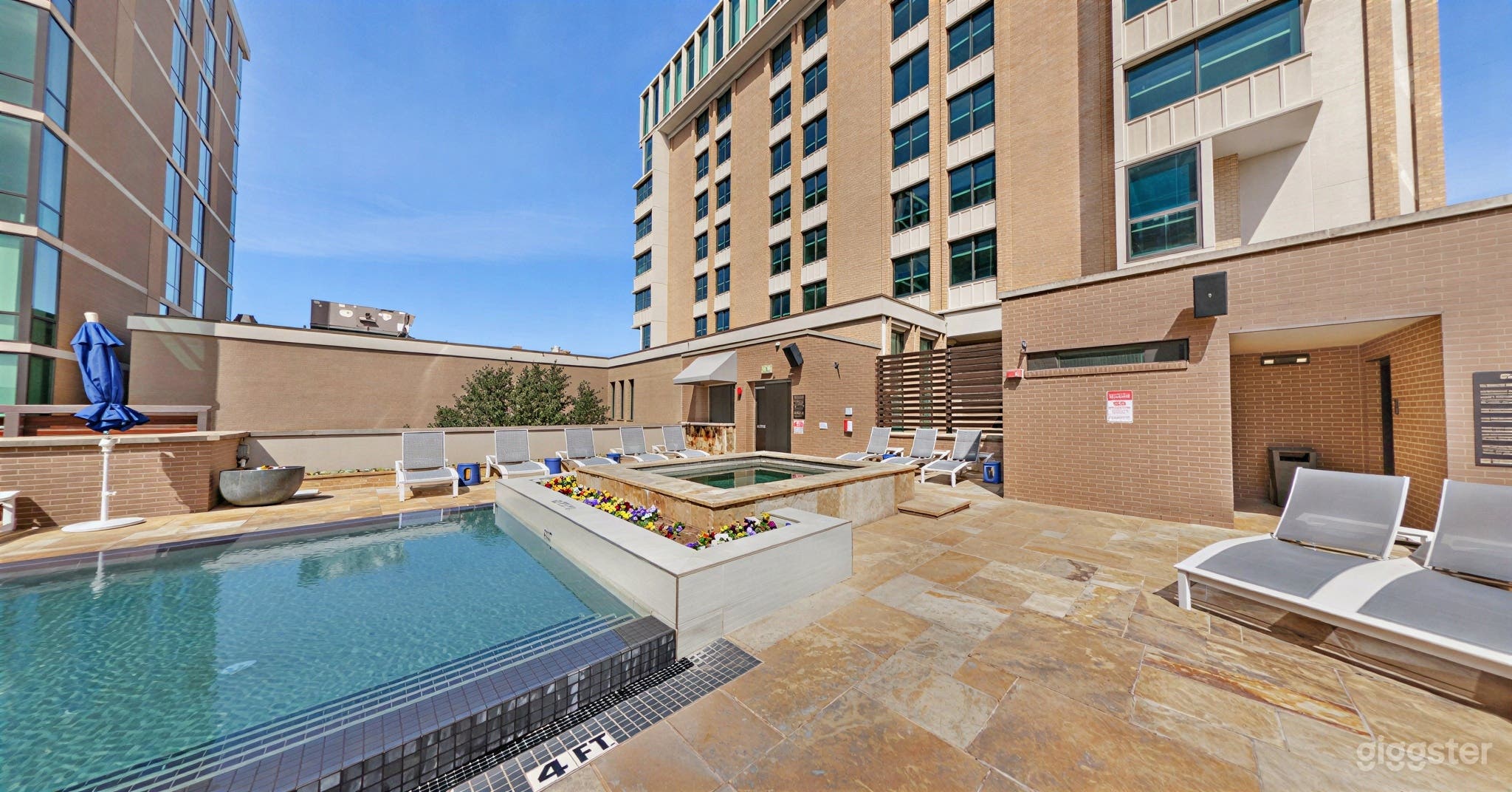 Classy Pool Deck in the Heart of Dallas Photo 1