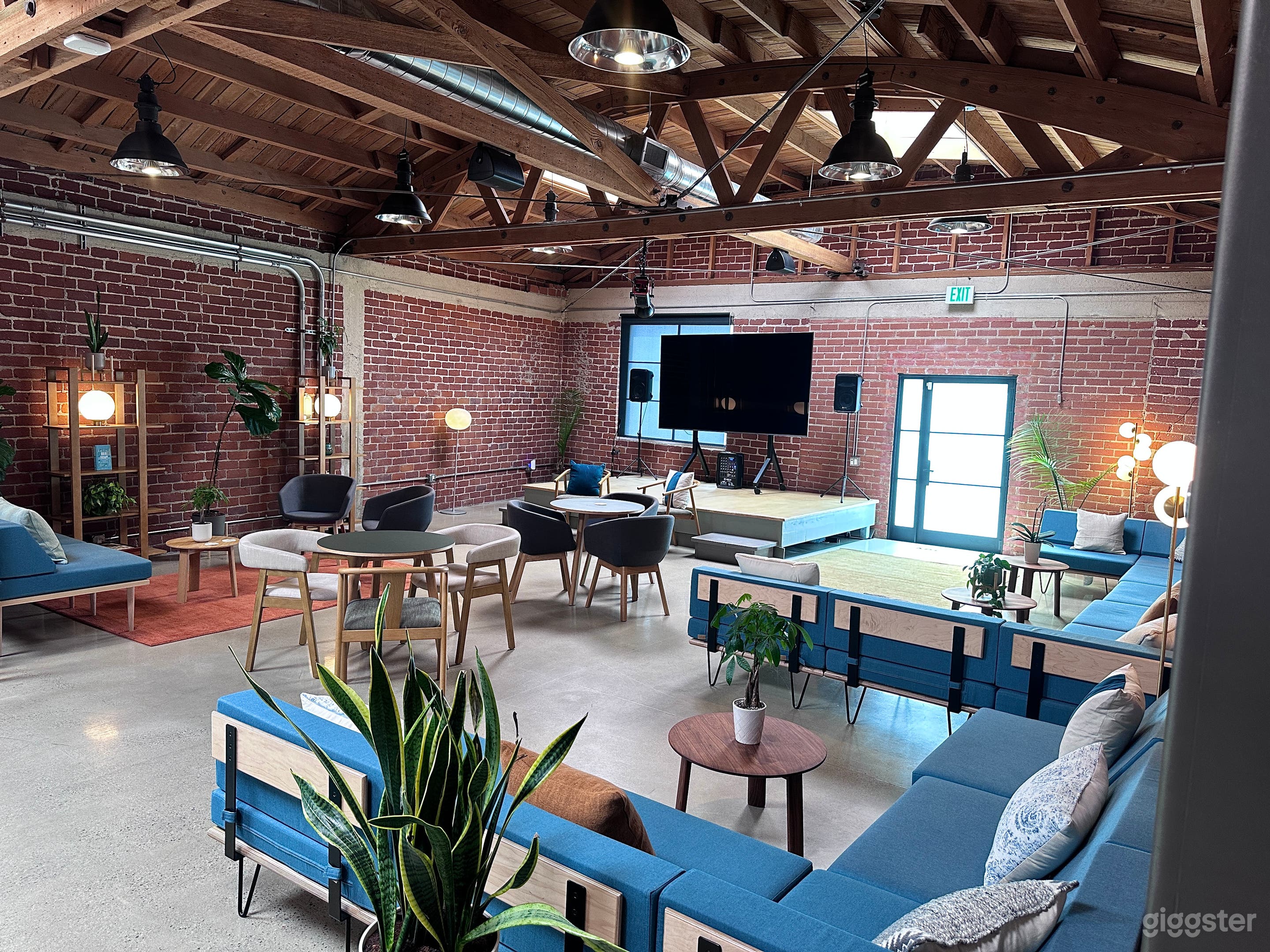 Loft 1 - Stage. TV, speakers and black out curtains available.