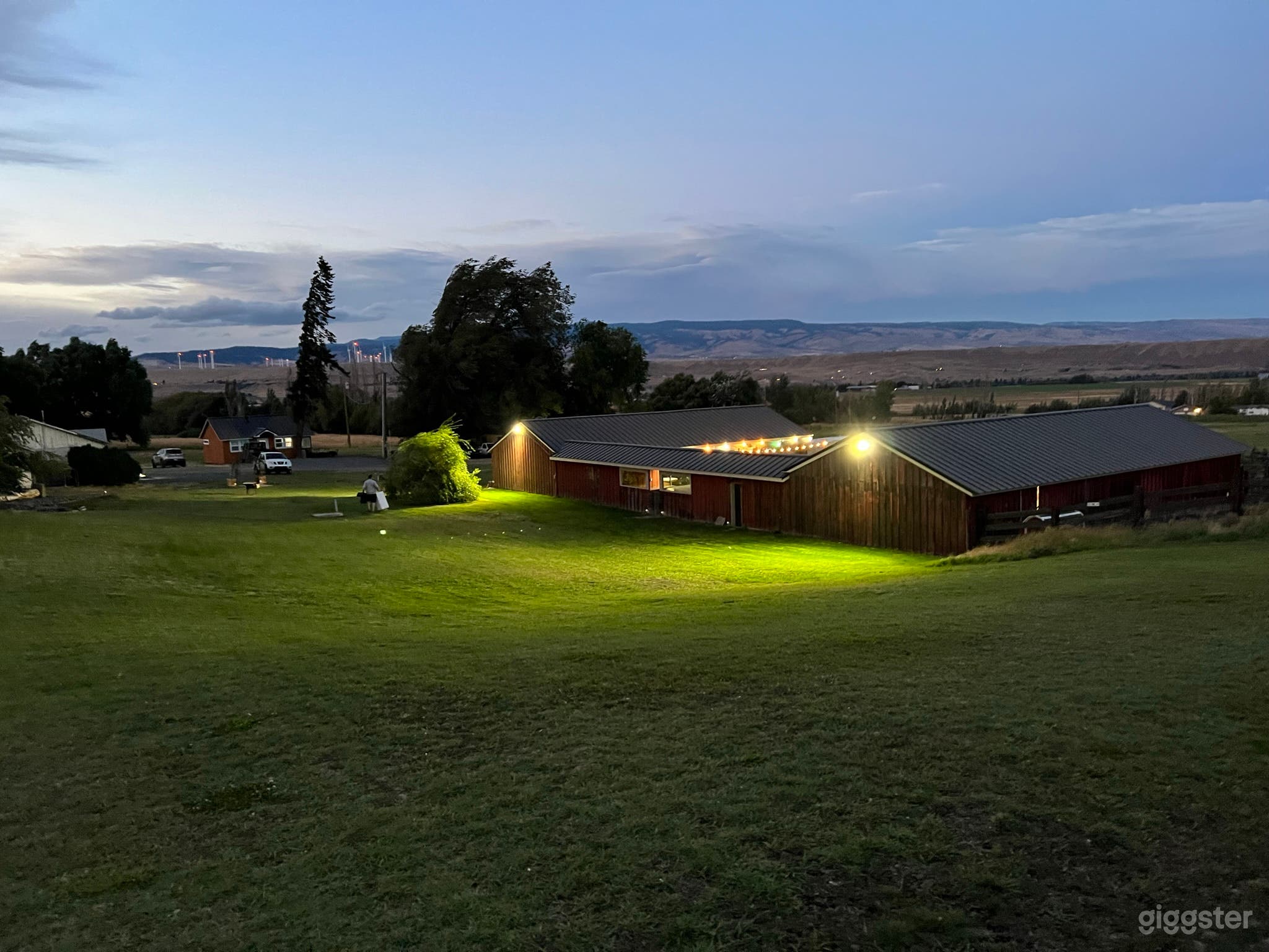 Front yard , barn , cabins, sprawling grassy yards , views of mountains 