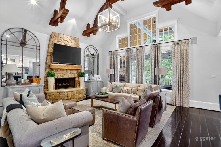  Designers dream living room with sky high ceiling with showcase wooden beamed ceiling 