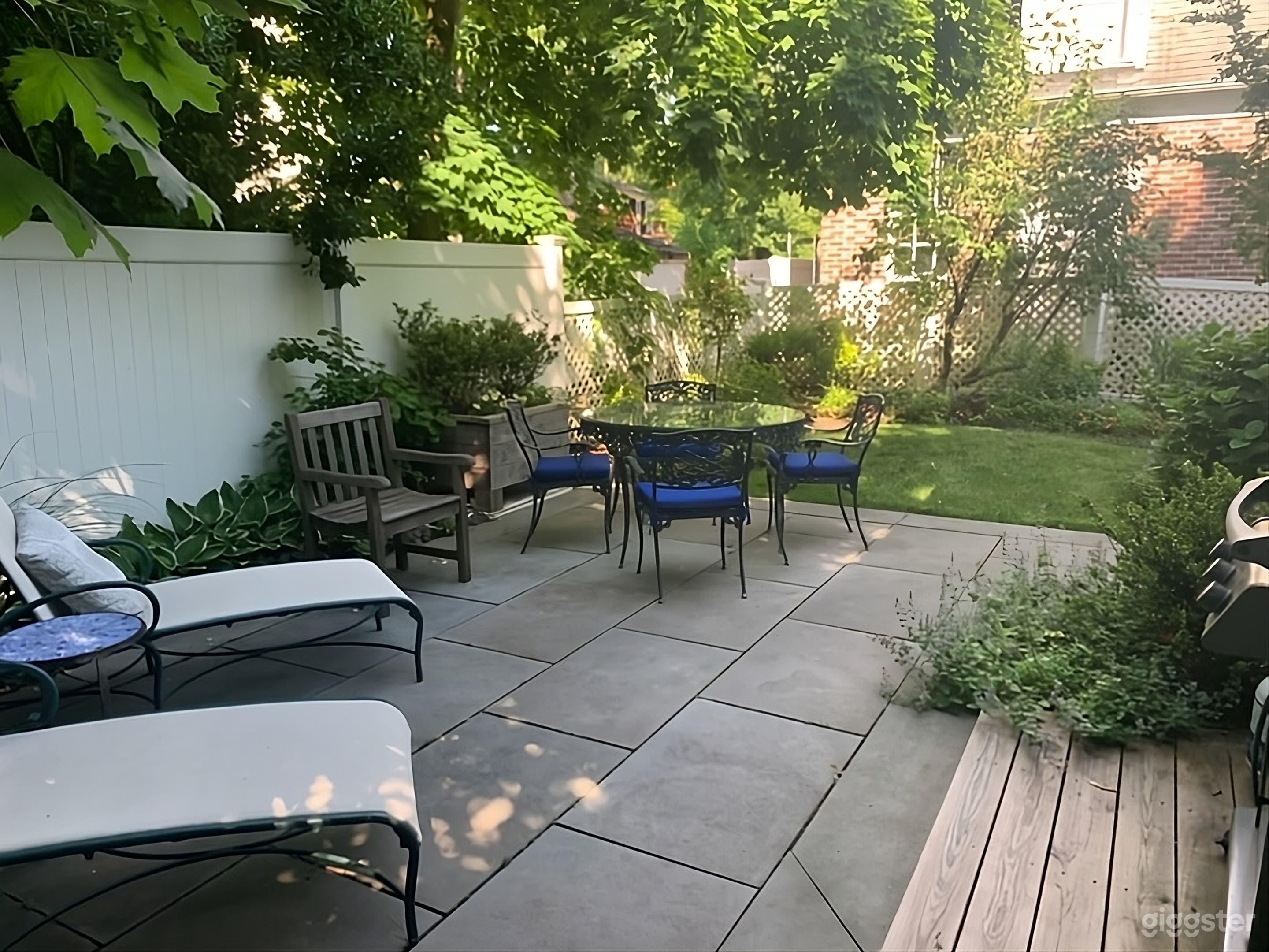 Lush Fenced Backyard Photo 2