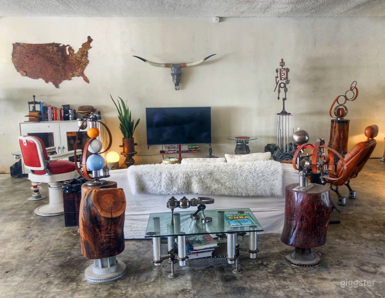  Interior gallery space with metal sculptures by artist Giuliano Belle. 