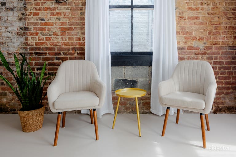  Natural Light Photo Studio with Exposed Brick 