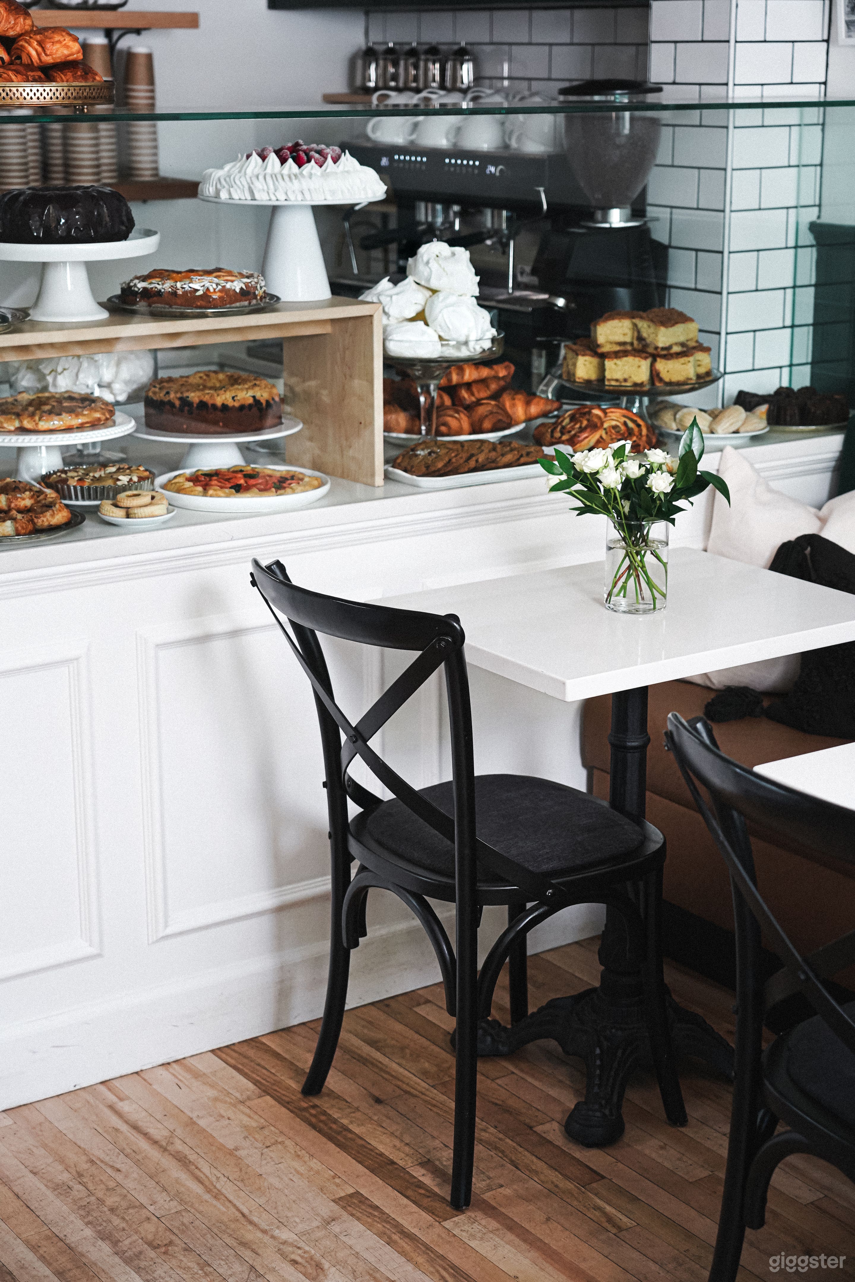 Seating area next to pastry case