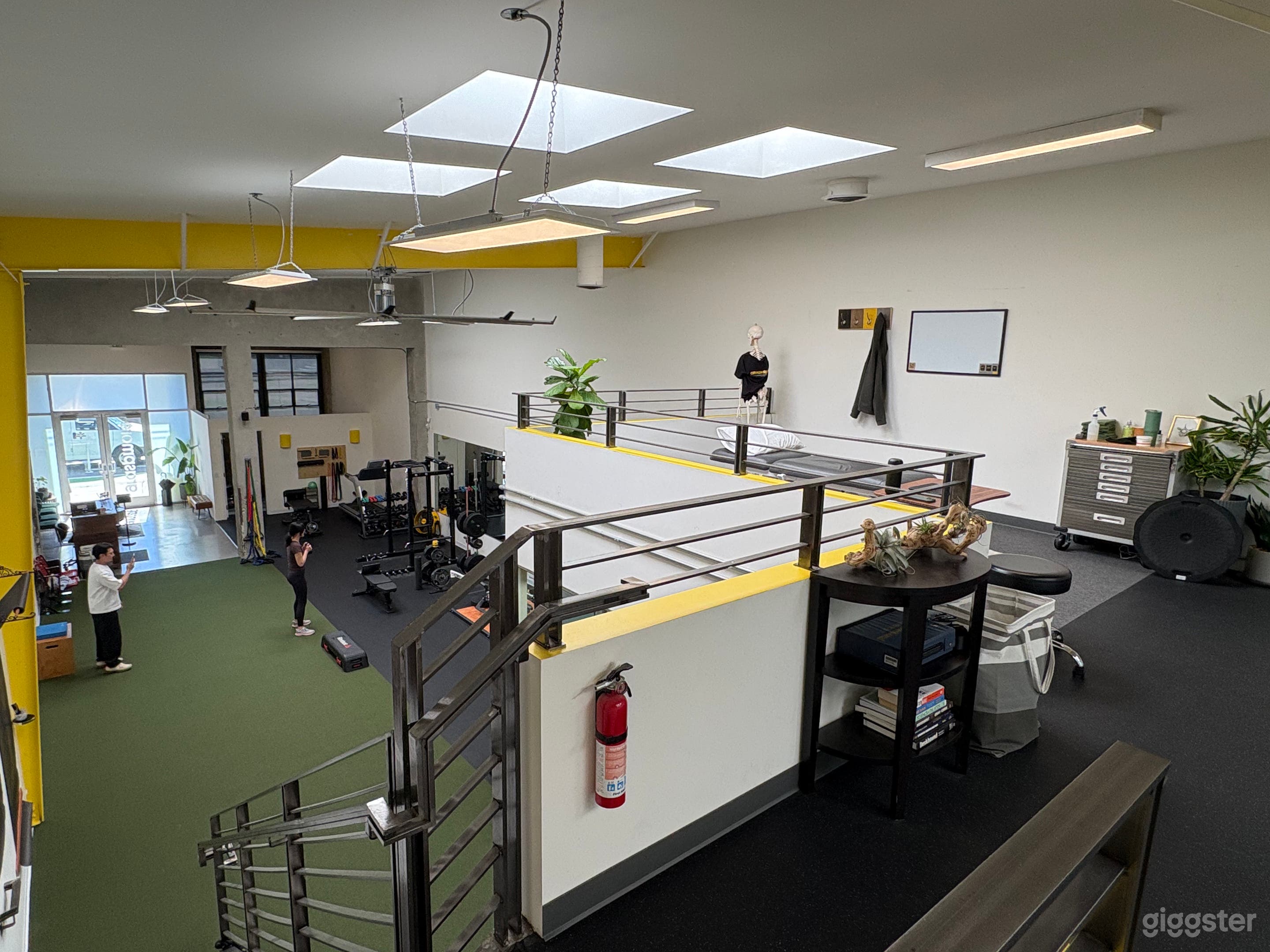 Spacious Industrial Loft Boutique Gym with Natural Light Photo 1