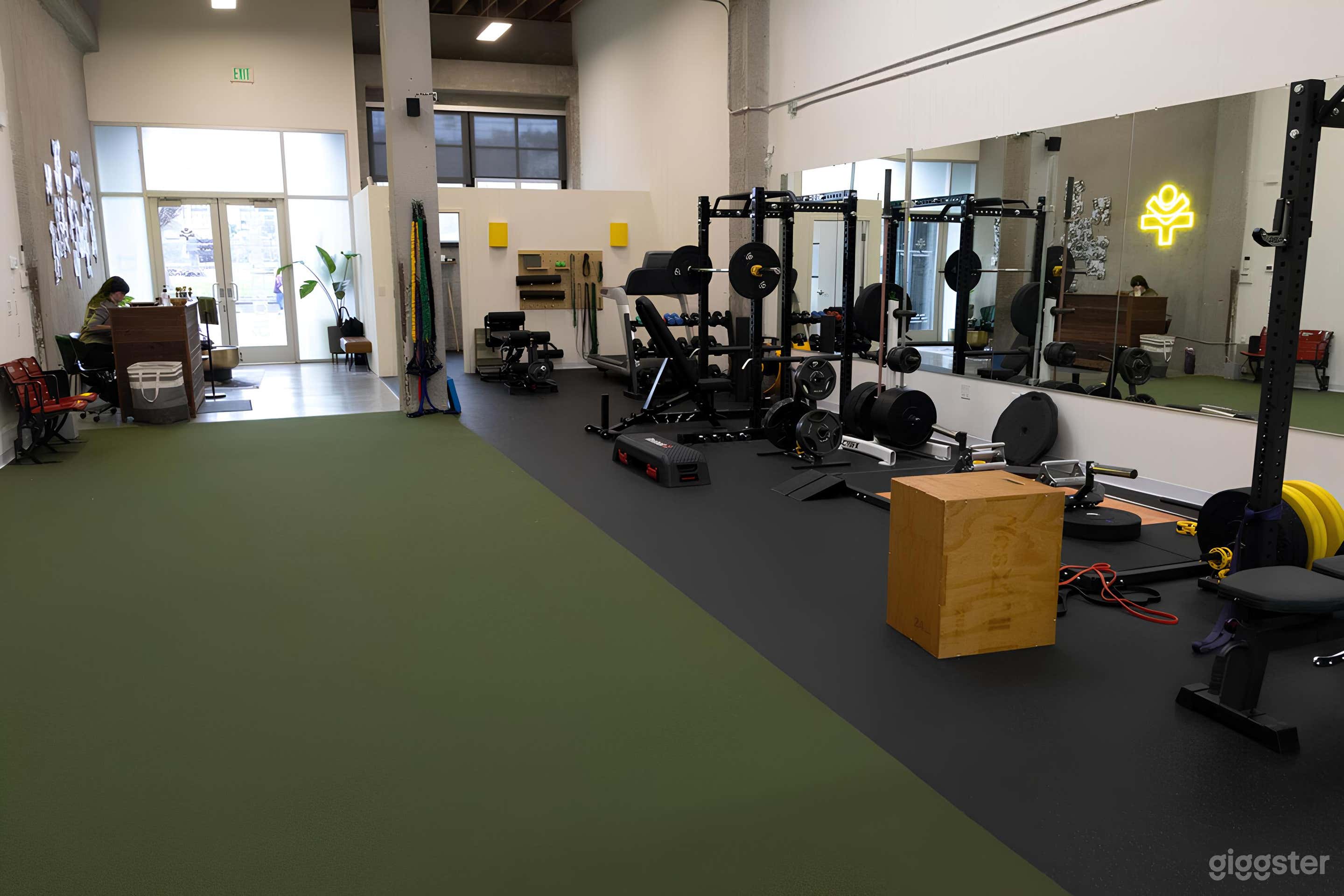 Spacious Industrial Loft Boutique Gym with Natural Light Photo 2